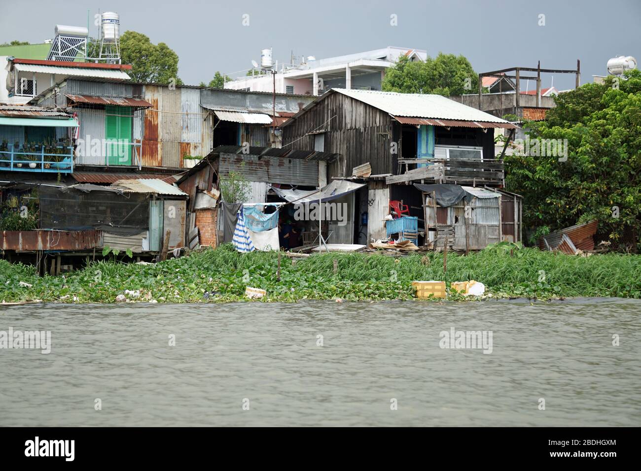 river shore life in can tho in southern vietnam Stock Photo