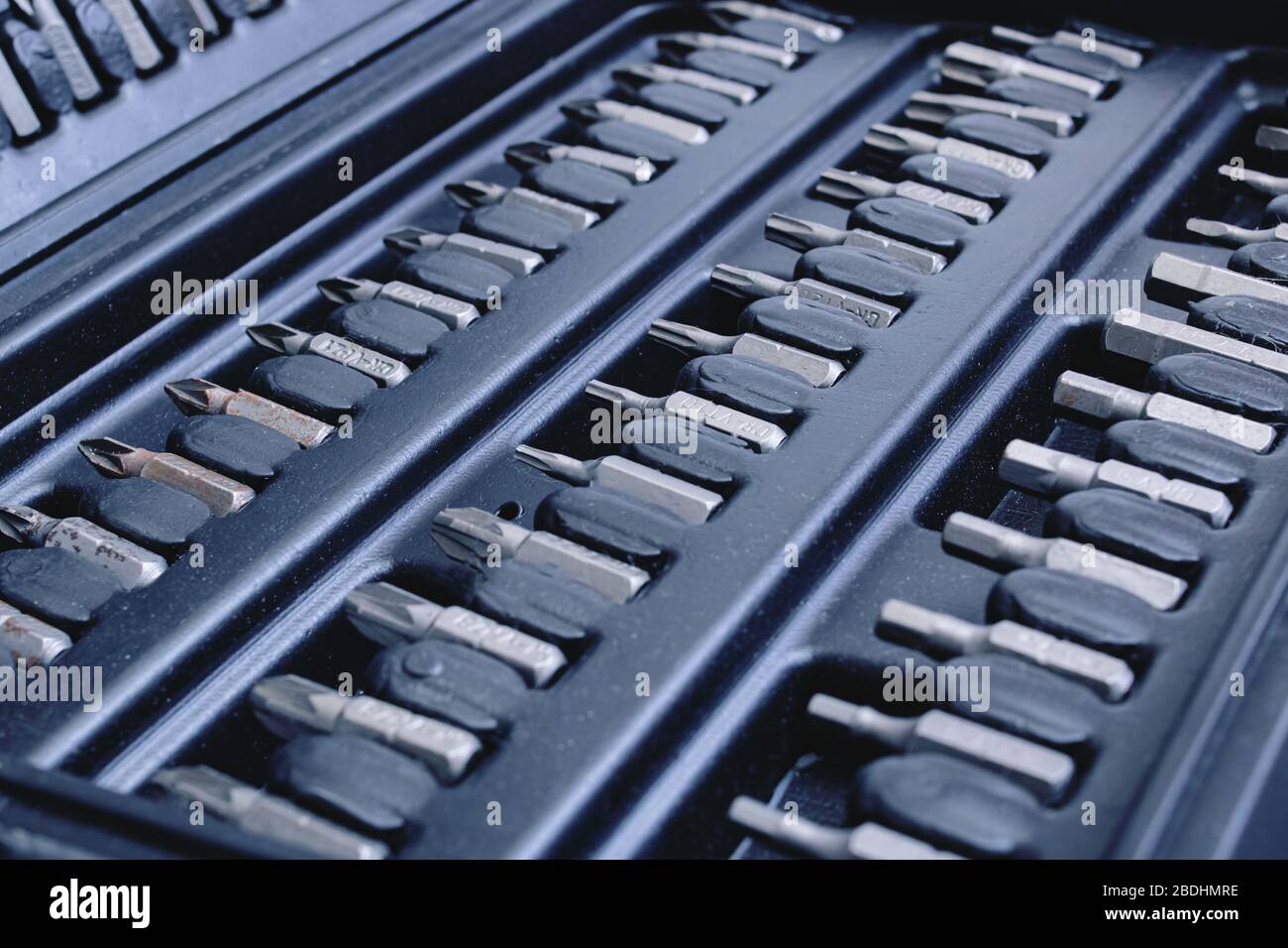 Black plastic box with bits for screwdriver close up Stock Photo