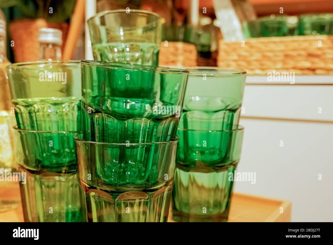 https://c8.alamy.com/comp/2BDJ27T/stack-of-glasses-on-top-of-coffee-machine-in-a-coffee-housestack-of-water-glasses-on-the-shelfclean-drinking-glasses-2BDJ27T.jpg