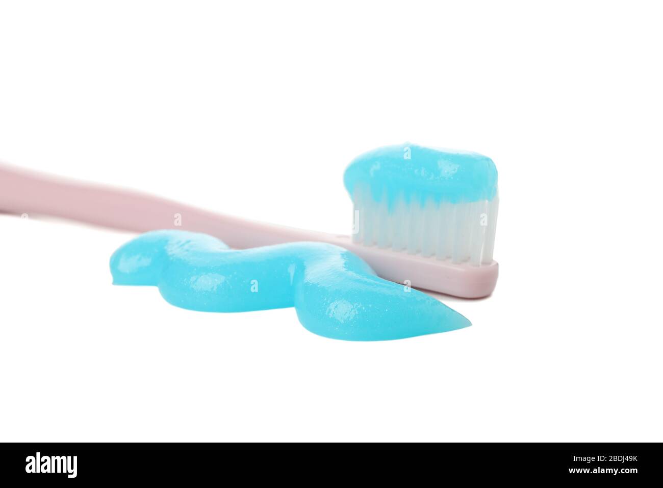 Toothbrush with toothpaste isolated on white background Stock Photo - Alamy