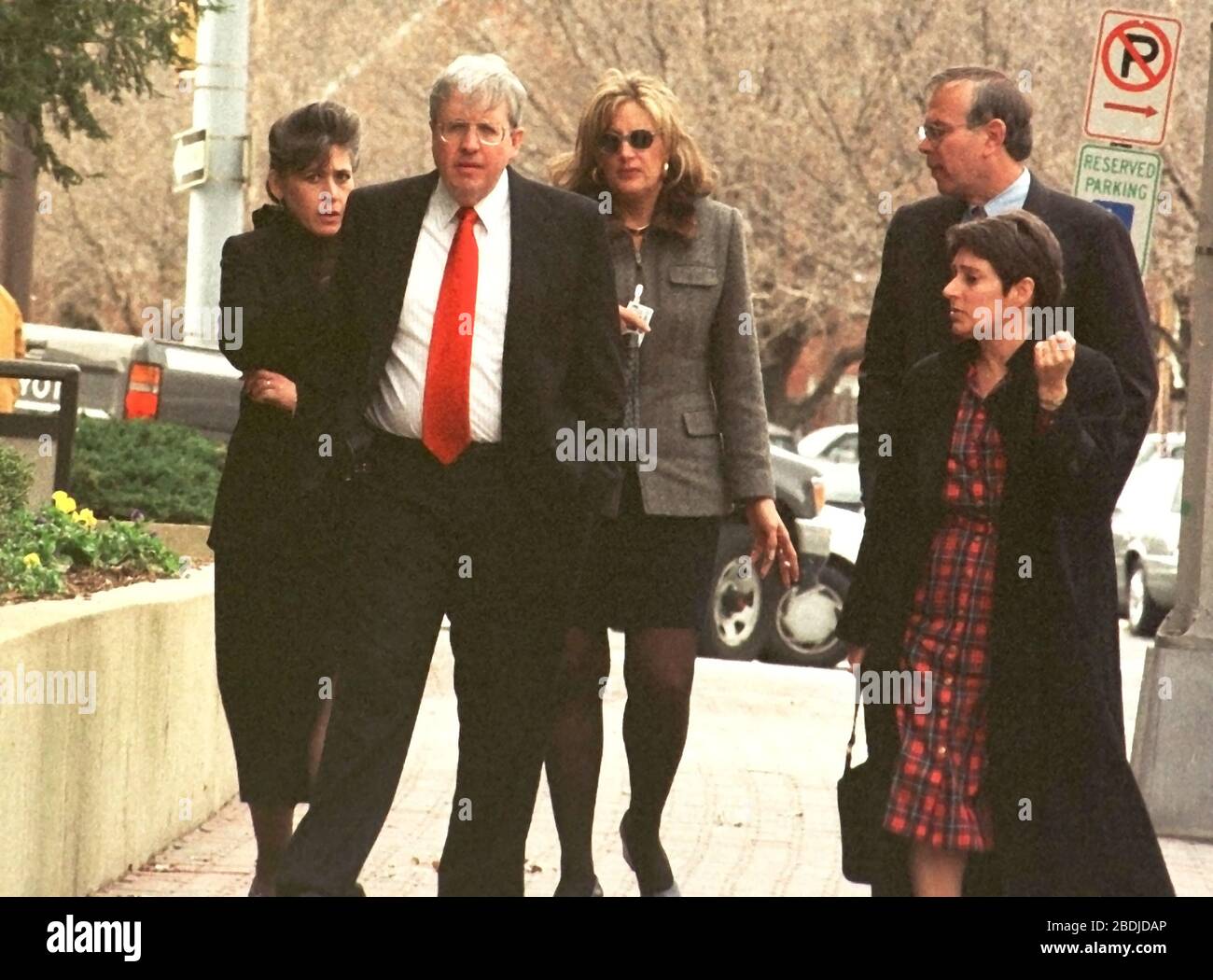 Arlington, VA - March 3, 1999 -- Linda Tripp (wearing a gray jacket) with unidentified people on Wilson Blvd in front of the building where she now works on 3 March, 1999.Credit: Ron Sachs/CNP (RESTRICTION: NO New York or New Jersey Newspapers or newspapers within a 75 mile radius of New York City) | usage worldwide Stock Photo