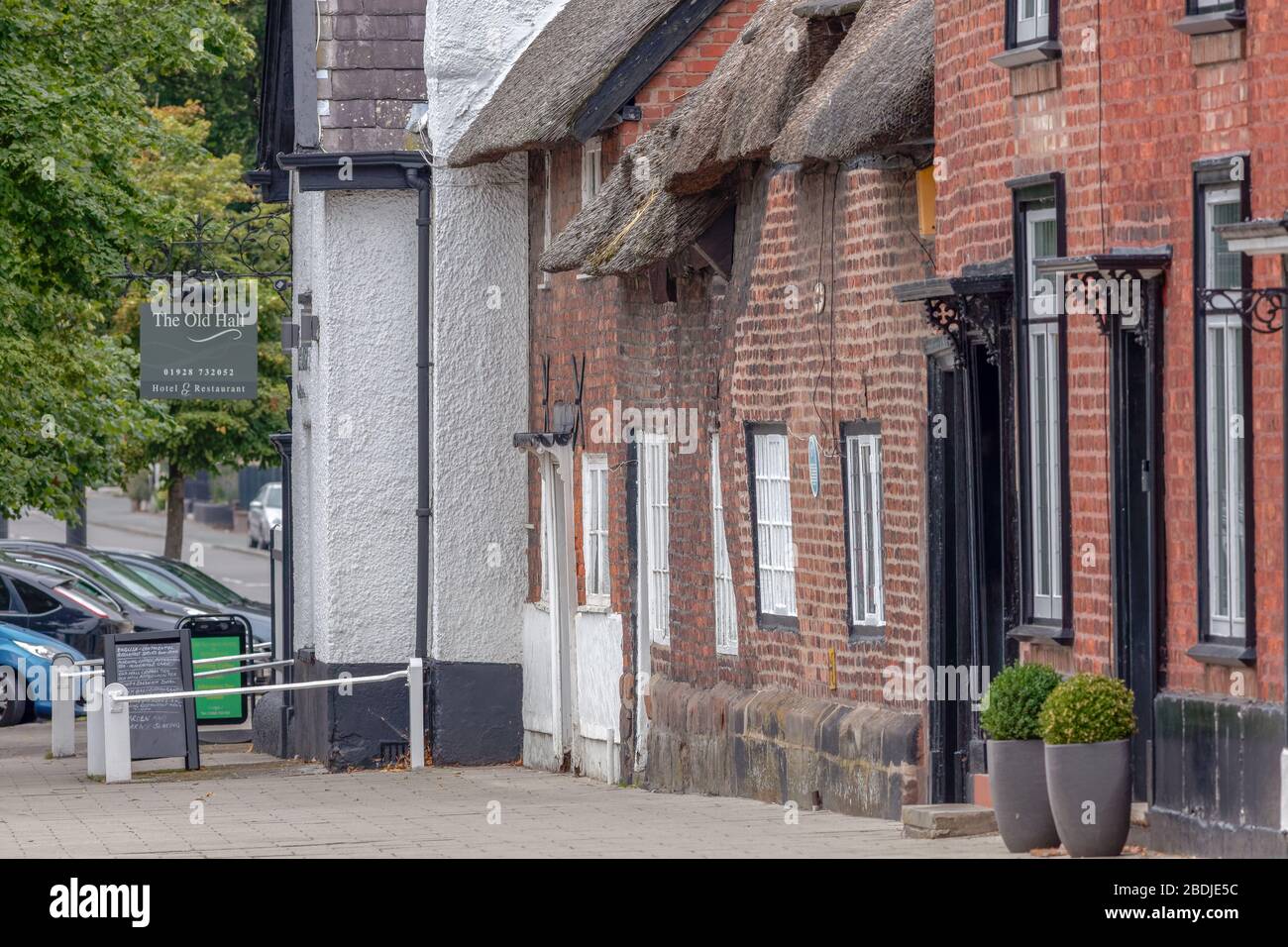 Seventeenth century cottages next to the Old Hall Hotel on the main street in Frodsham, Cheshire
