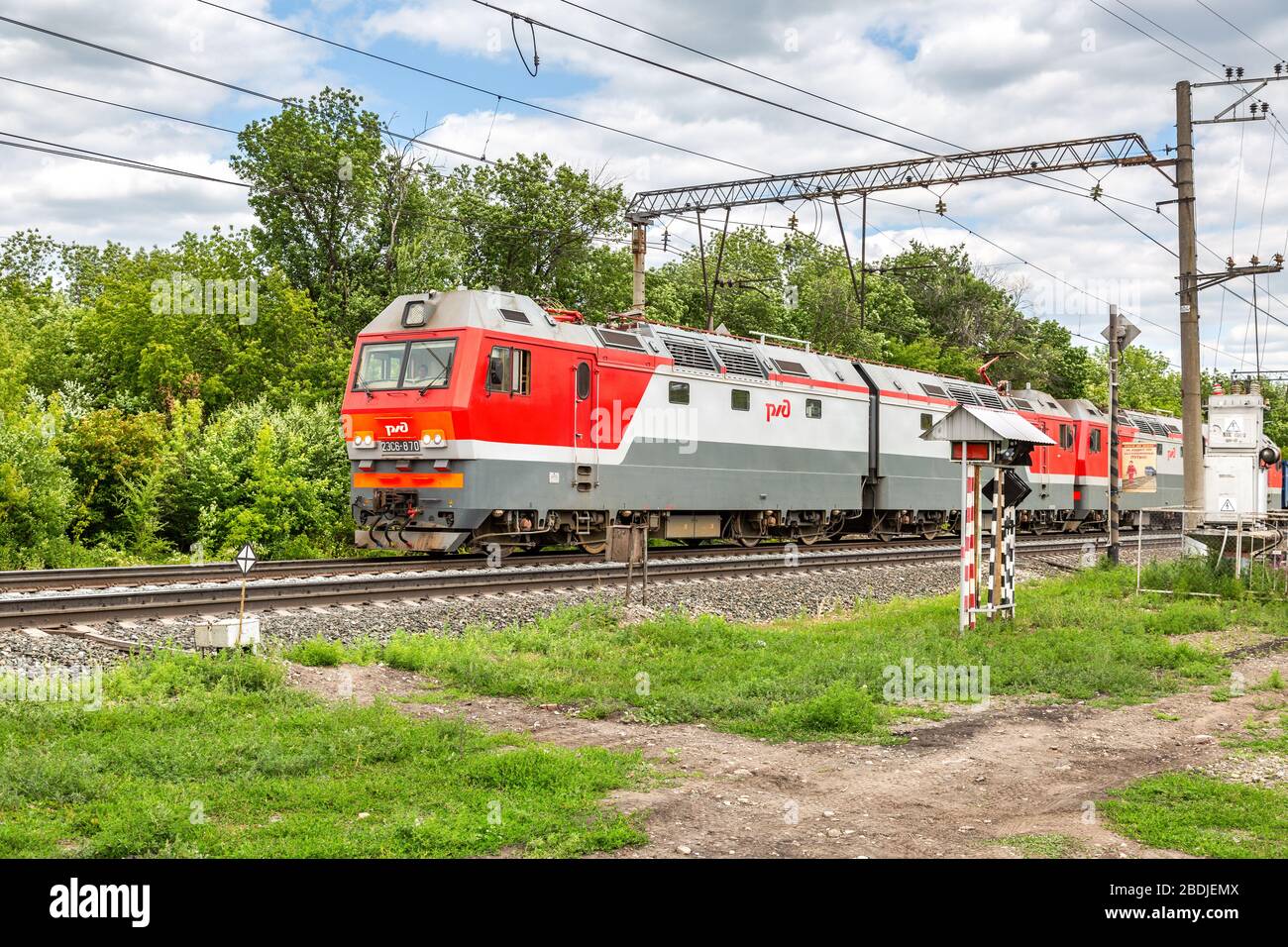 Penza, Russia - July 6, 2019: Russian electric locomotive with freight  train. Cargo train logistic of Russian railway Stock Photo