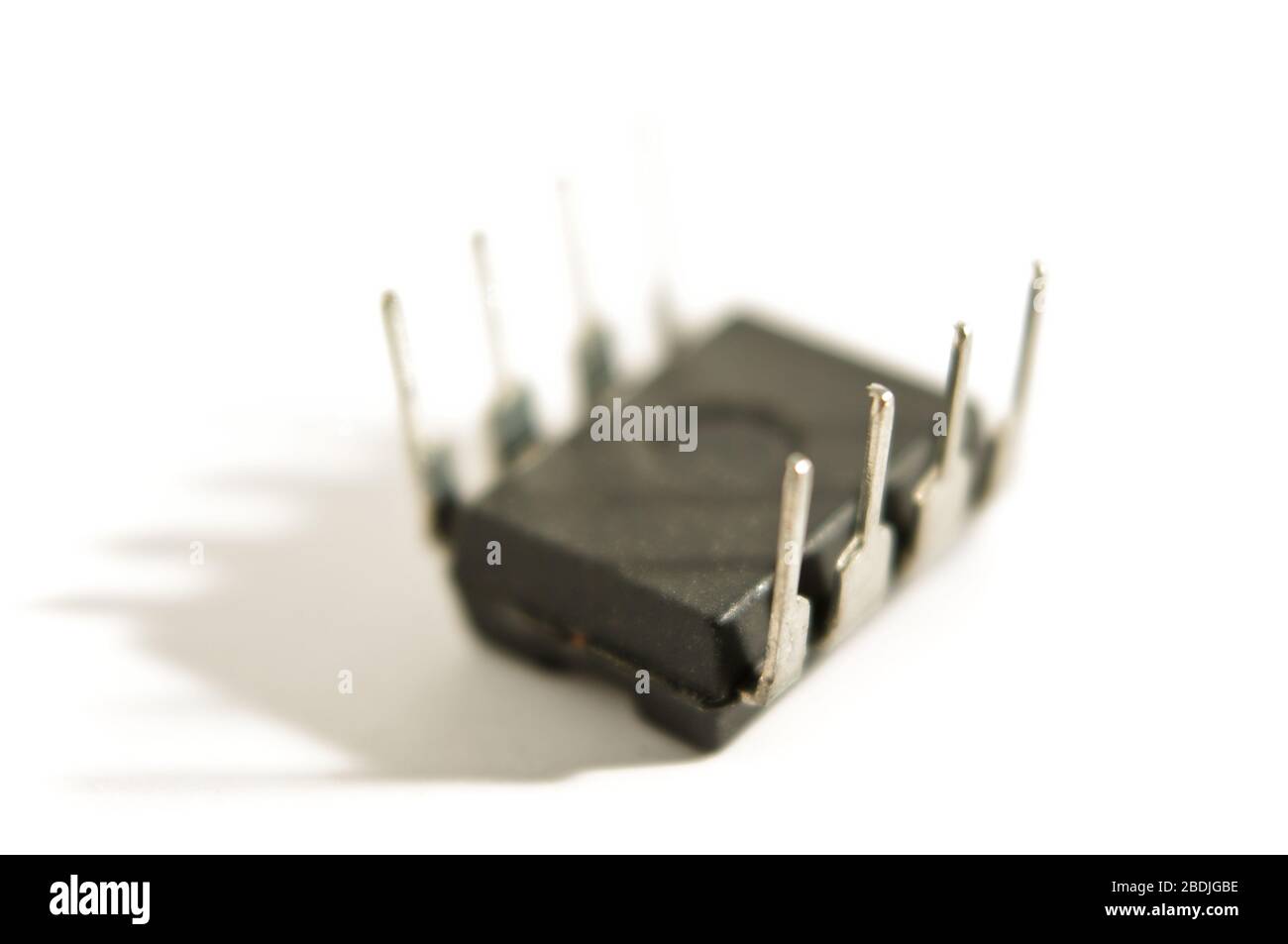Integrated circuit upside down on the white background Stock Photo