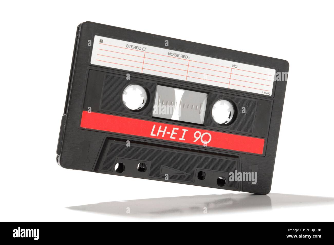 Audio cassette with magnetic encoded information isolated on the white background Stock Photo