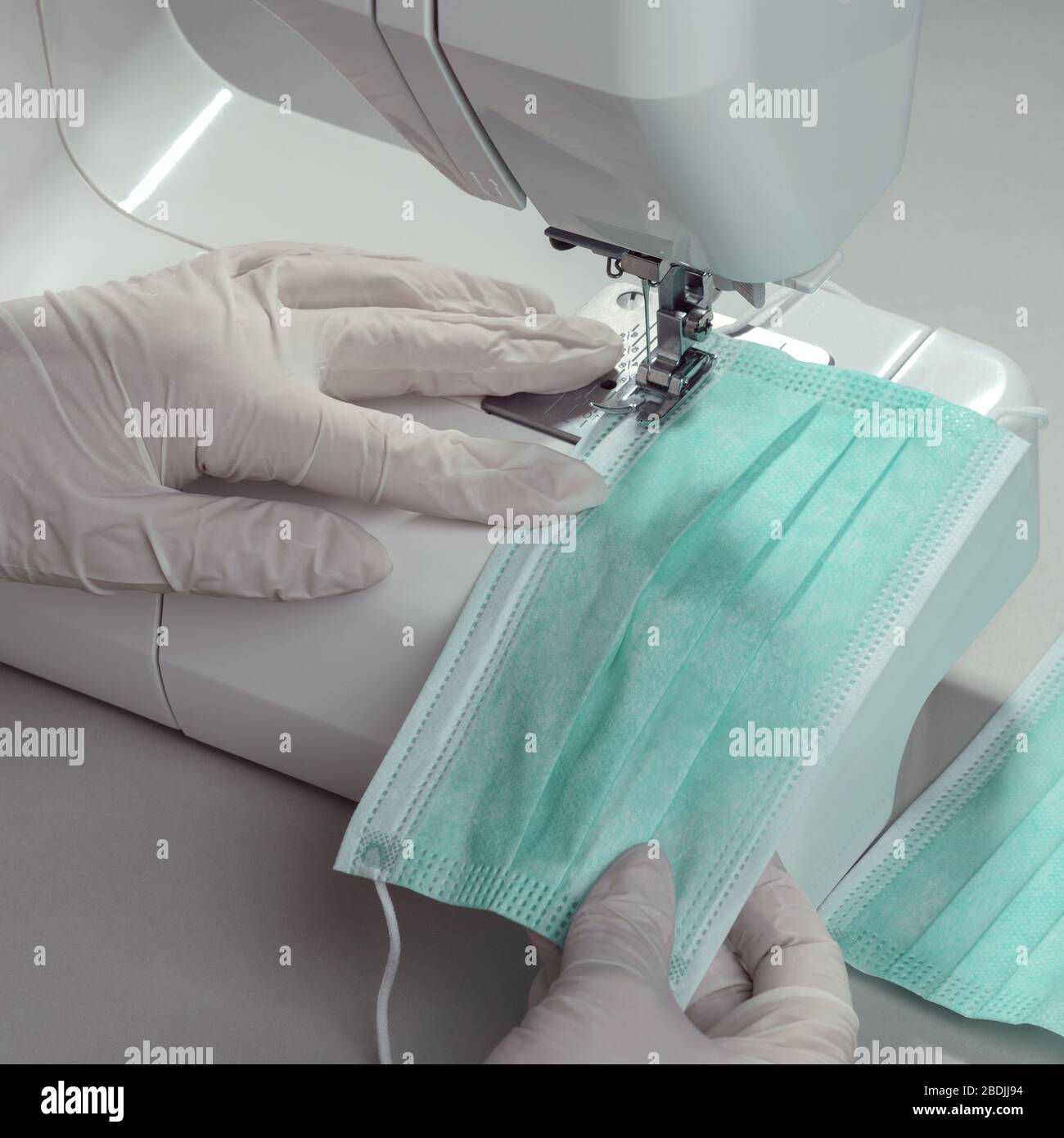 Face masks and gloves sewing hi-res stock photography and images - Alamy