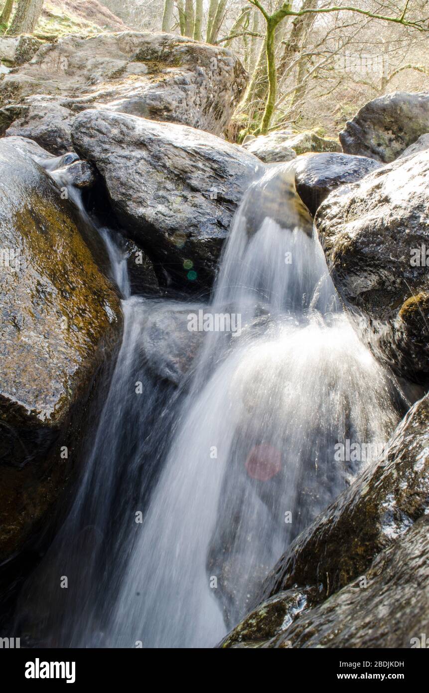 Small Stream, Water Flowing over rocks Stock Photo - Alamy
