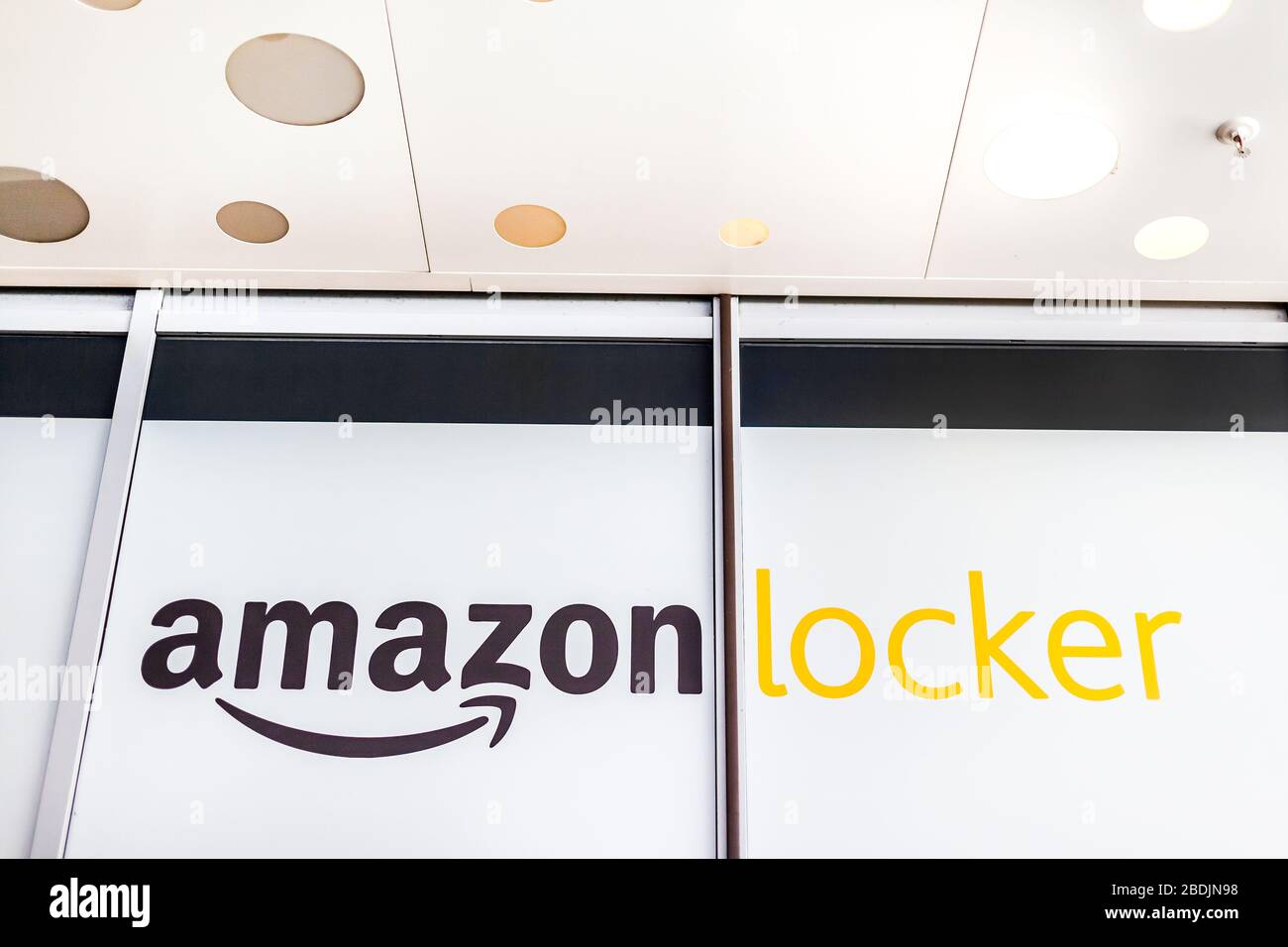 Amazon Locker in shopping mall, brand logo on pick up point for mail order goods. Lyon, France - February 23, 2020 Stock Photo