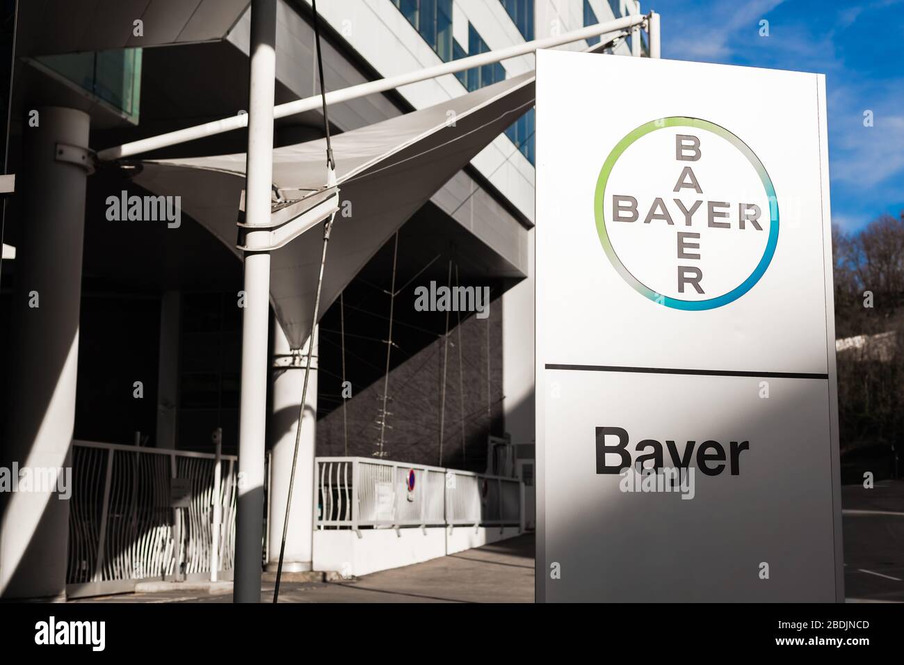Bayer AG, German multinational pharmaceutical and life sciences company, one of largest pharmaceutical companies in world brand, logo on its office bu Stock Photo