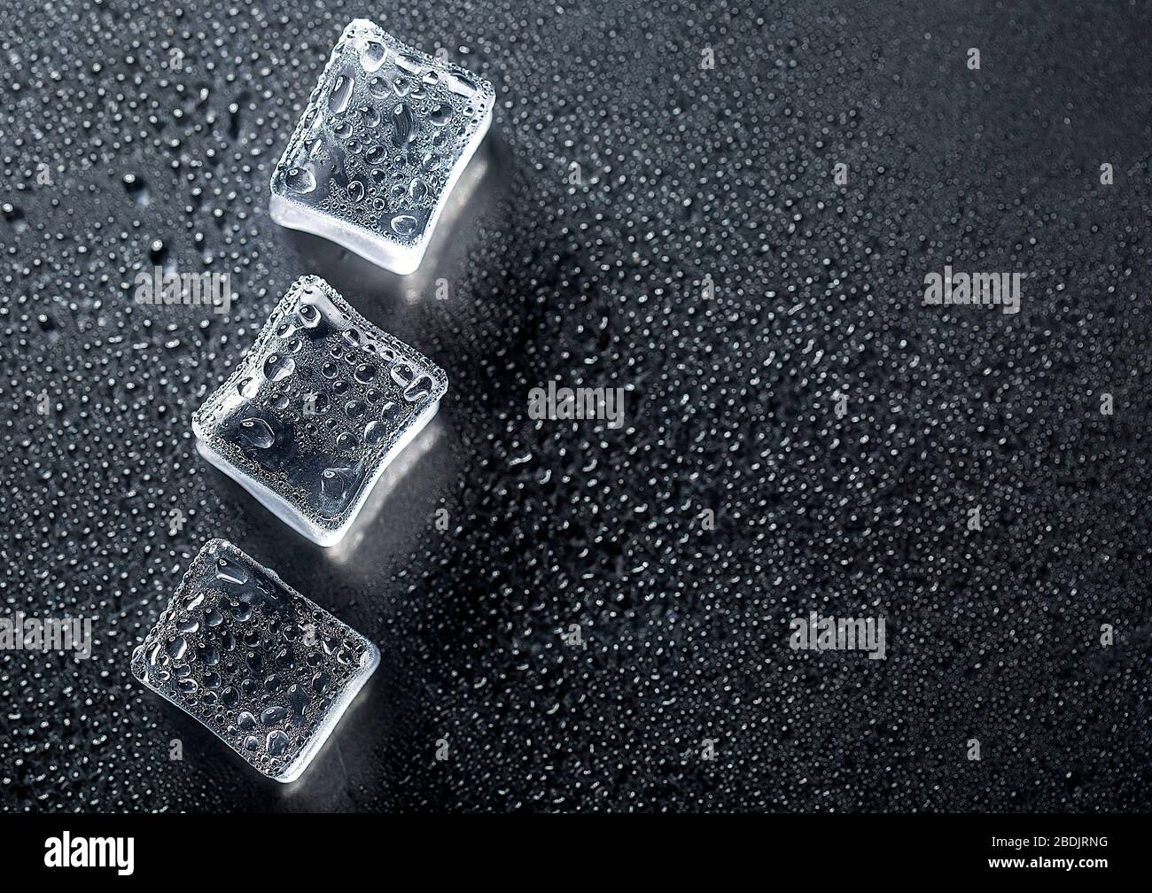Colored banner with fresh ice cubes and reflections Stock Photo