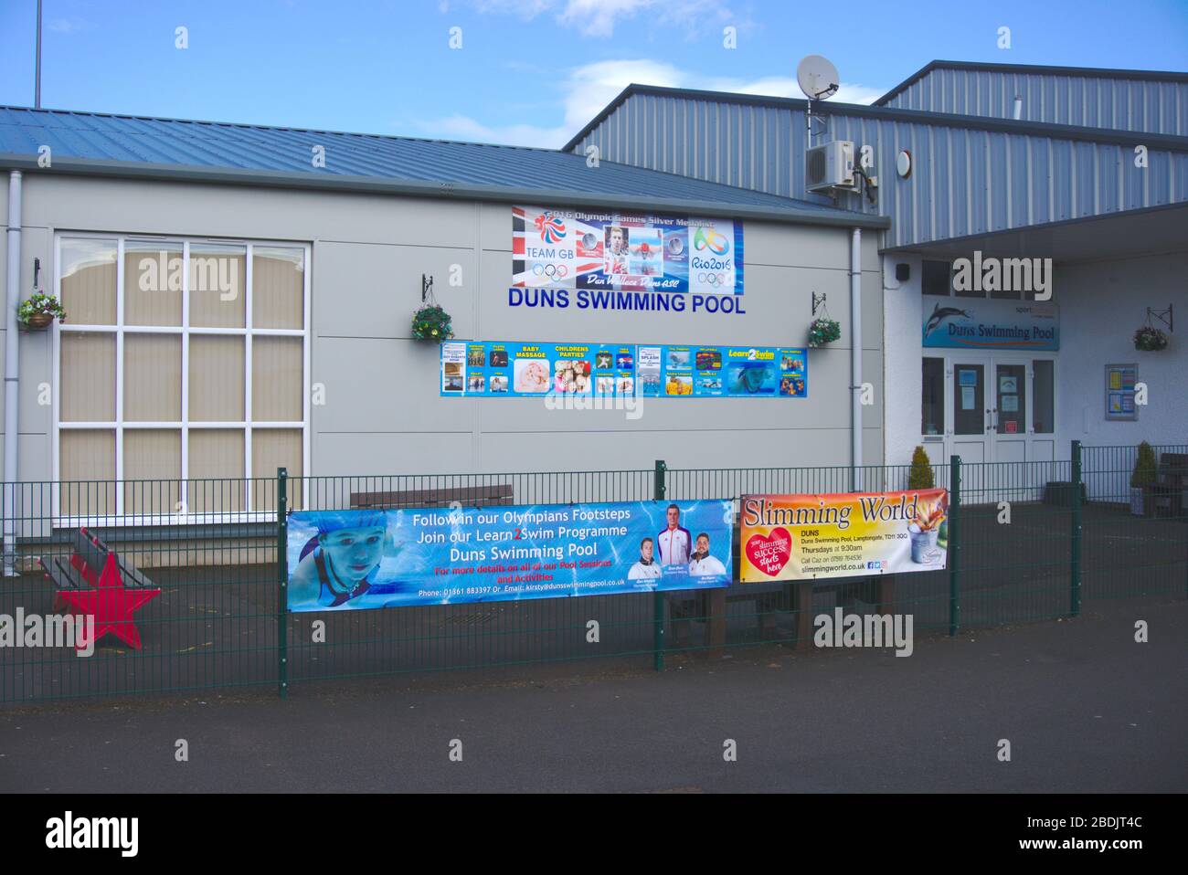 Exterior of Duns Swimming Pool, Berwickshire, Scottish Borders, UK, with posters. Stock Photo