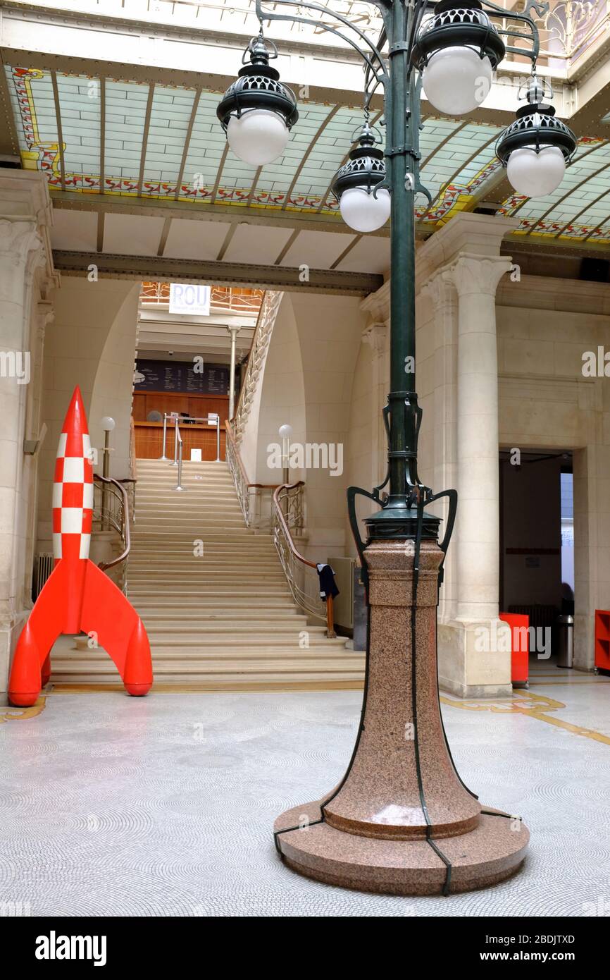 The entrance hall of Belgian Comic Strip Center with Tintin rocket.Brussels.Belgium Stock Photo