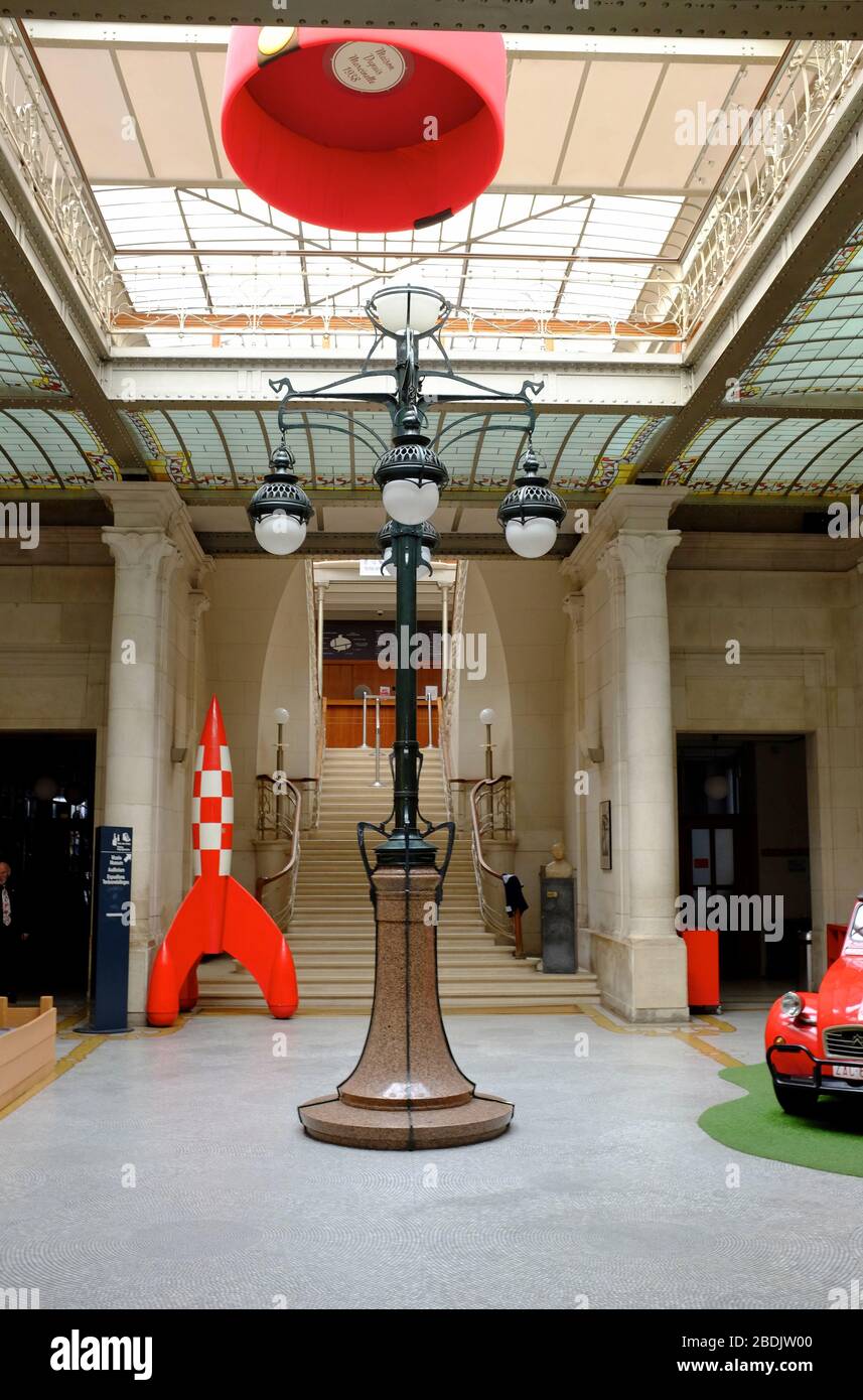 The entrance hall of Belgian Comic Strip Center with Tintin rocket.Brussels.Belgium Stock Photo
