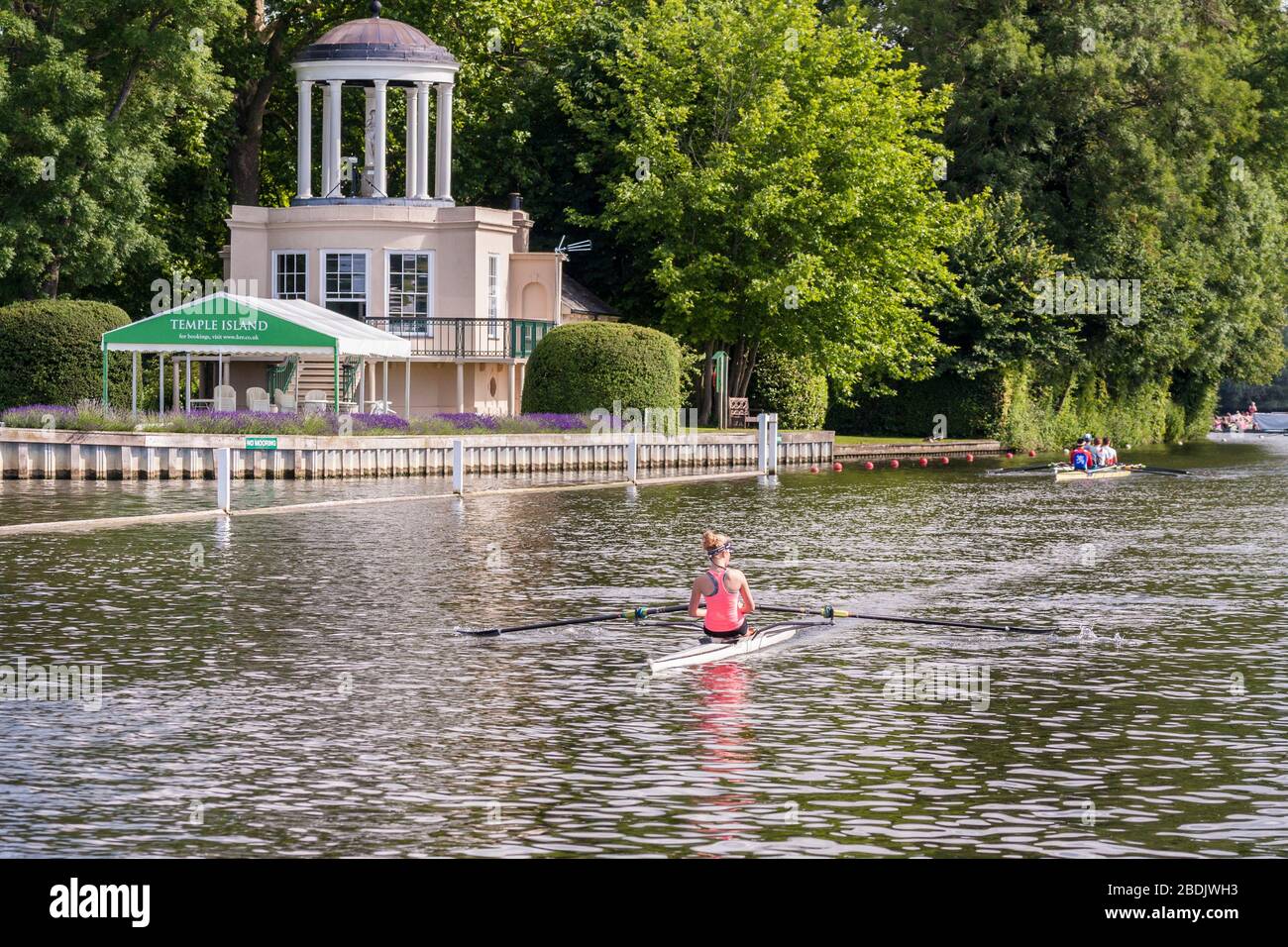 Rower passes Temple Island, Henley-on-Thames, Oxfordshire, England, GB, UK Stock Photo