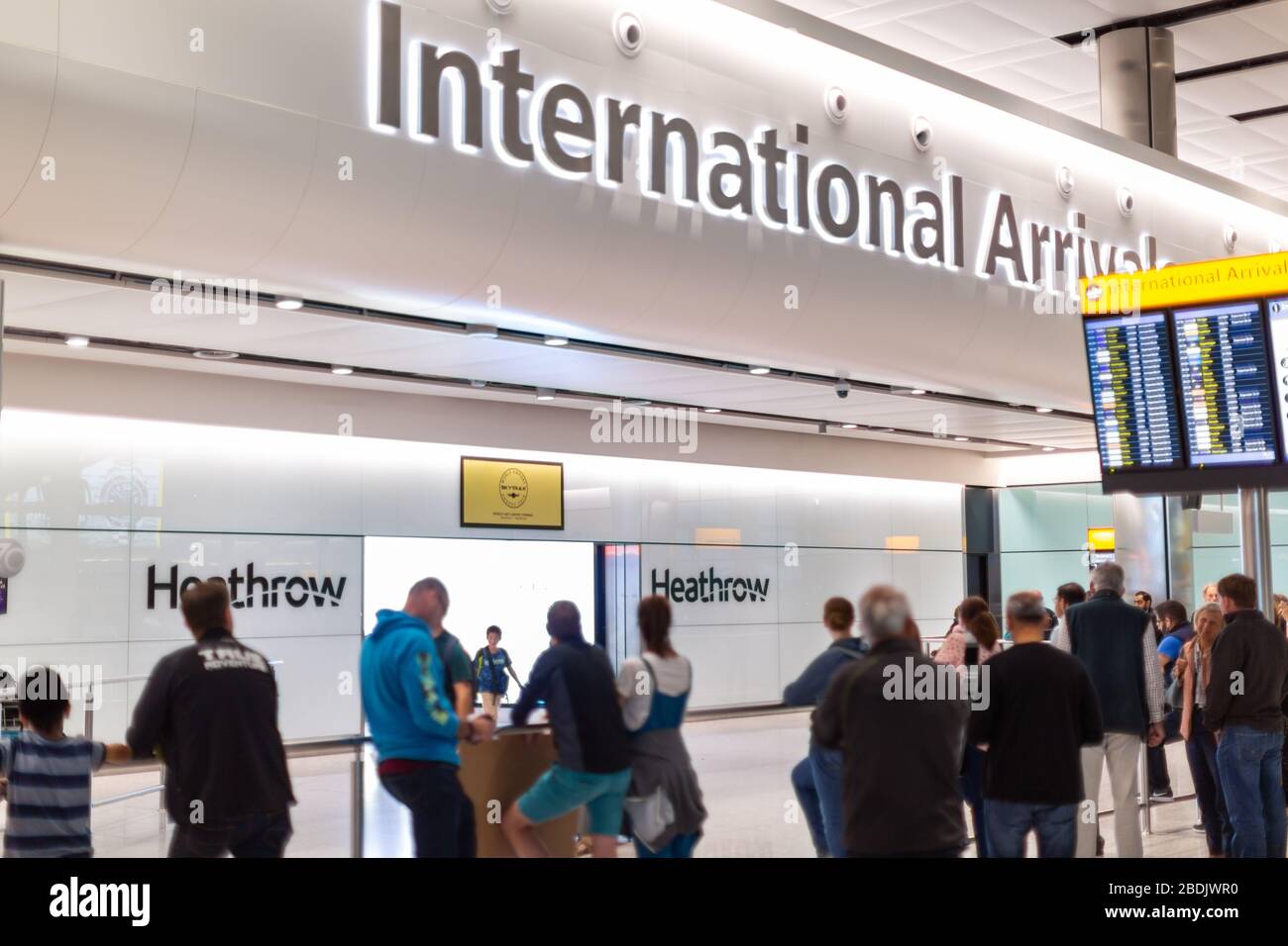 The arrival gate at London Heathrow Airport (LHR) in London England is the second busiest airport in the world serving more than 80 million passengers Stock Photo