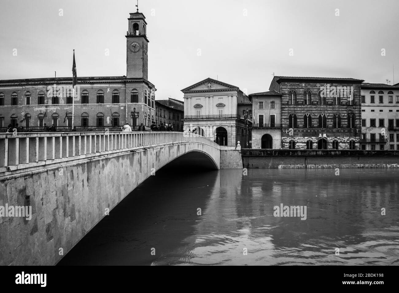 Black and white image of Ponte di Mezzo in Pisa over Arno river. Pisa, Tuscany, Italy, November 2019 Stock Photo
