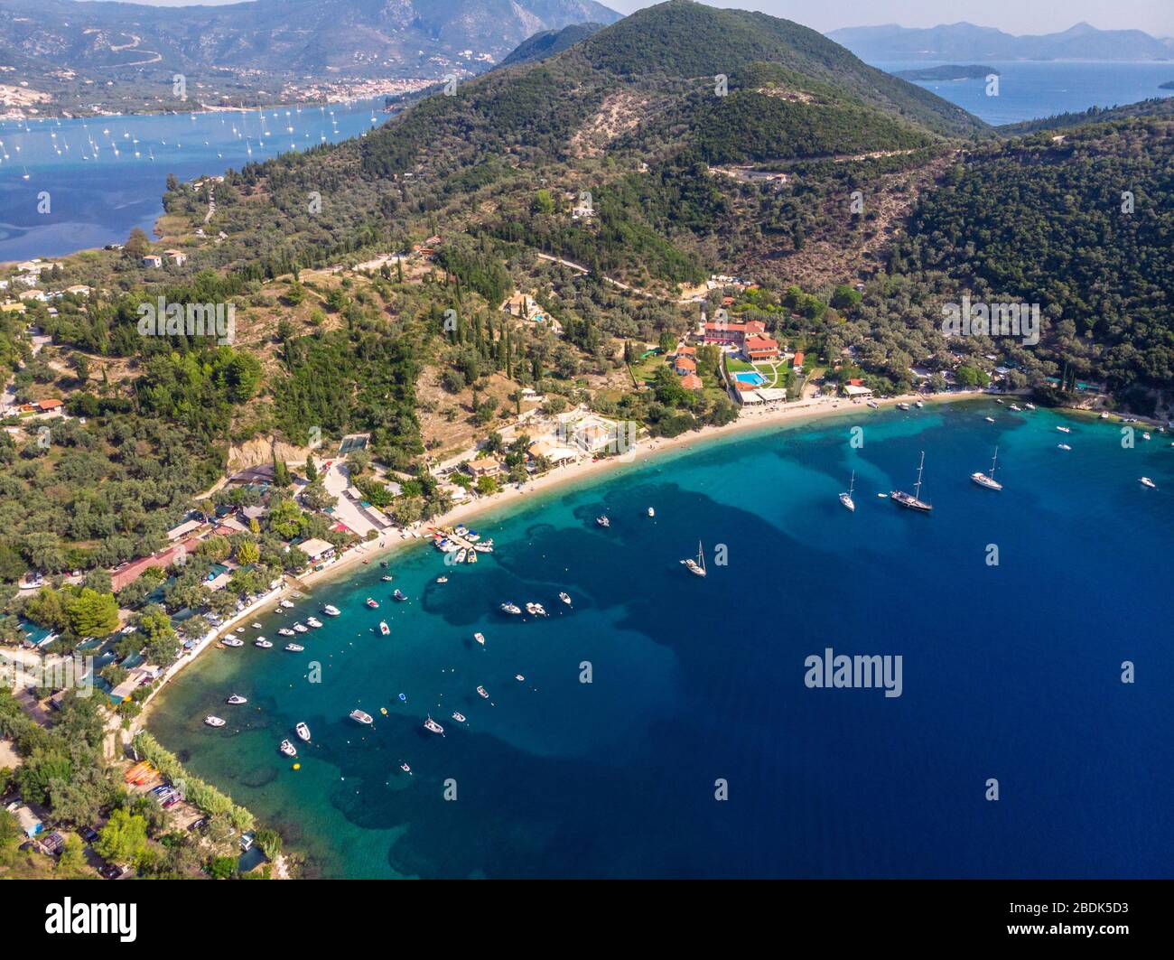 Desimi Beach Golf and nearby Island with clear water in Greece in summer. Stock Photo