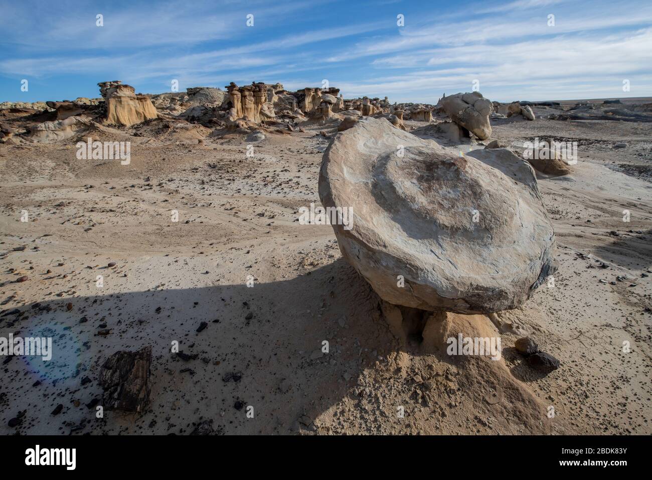 Large Rock Floating on Small Hoodoo in New Mexico Desert Stock Photo ...