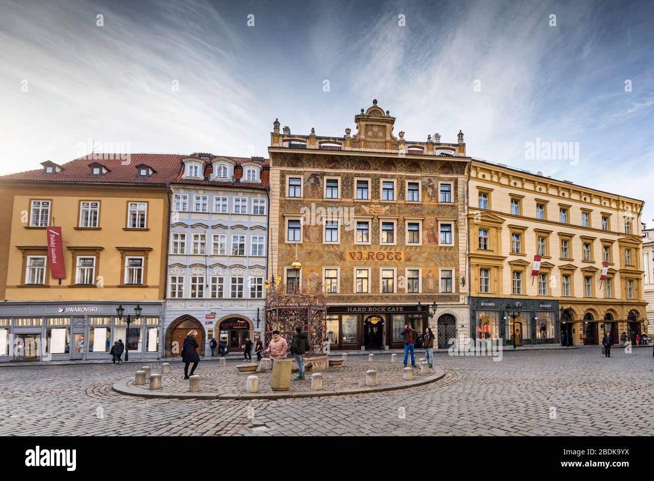 Male namesti, the small square with the renaissance fountain, Old Town in Prague. The Rott House now houses the Hard Rock Cafe Stock Photo