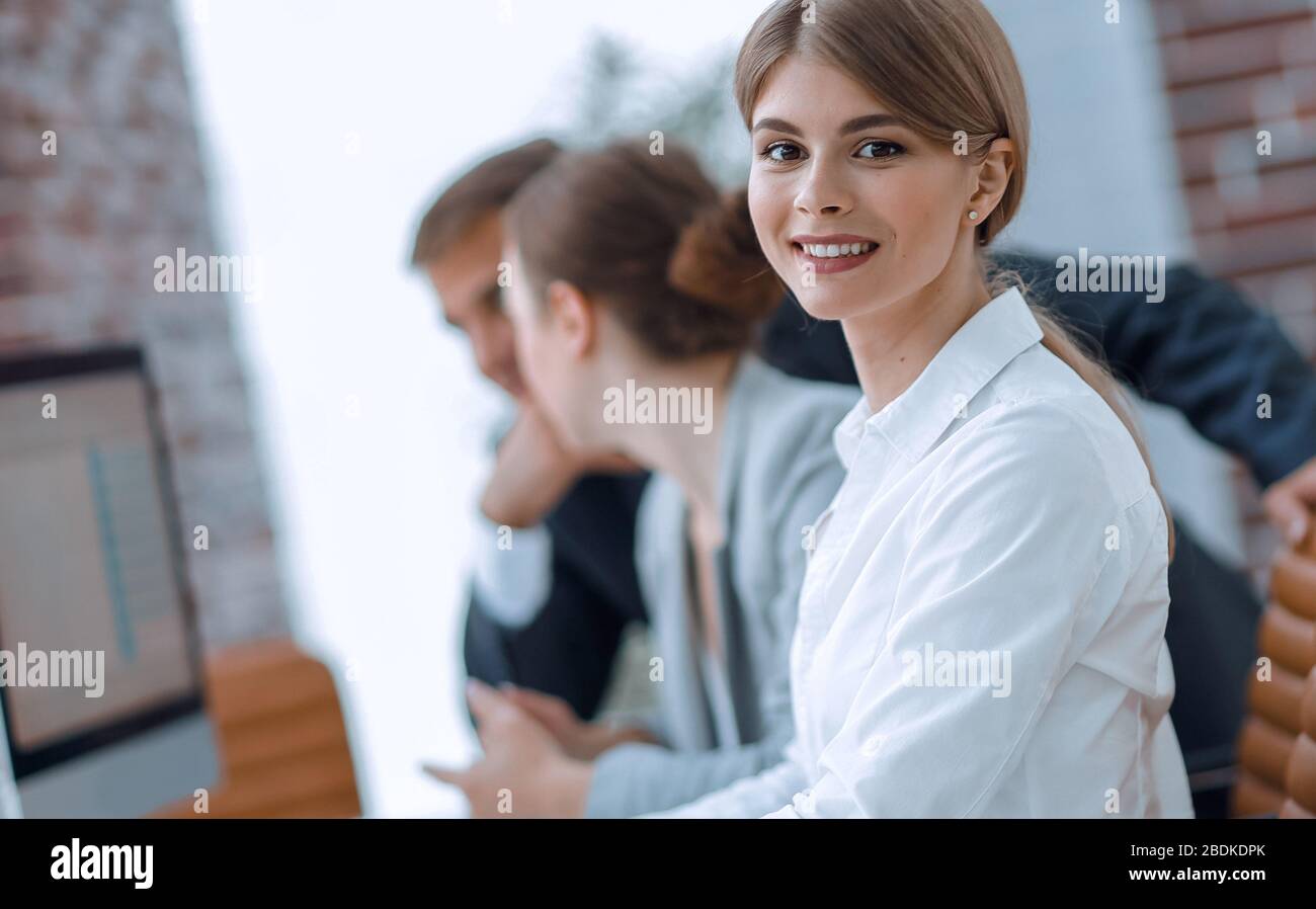 employees working on personal computers with financial data Stock Photo ...