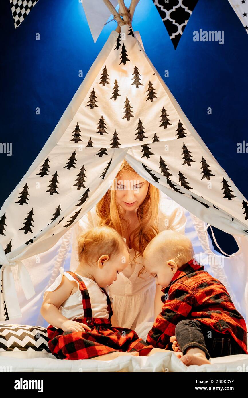 Charming positive young caucasian woman under the tent Stock Photo