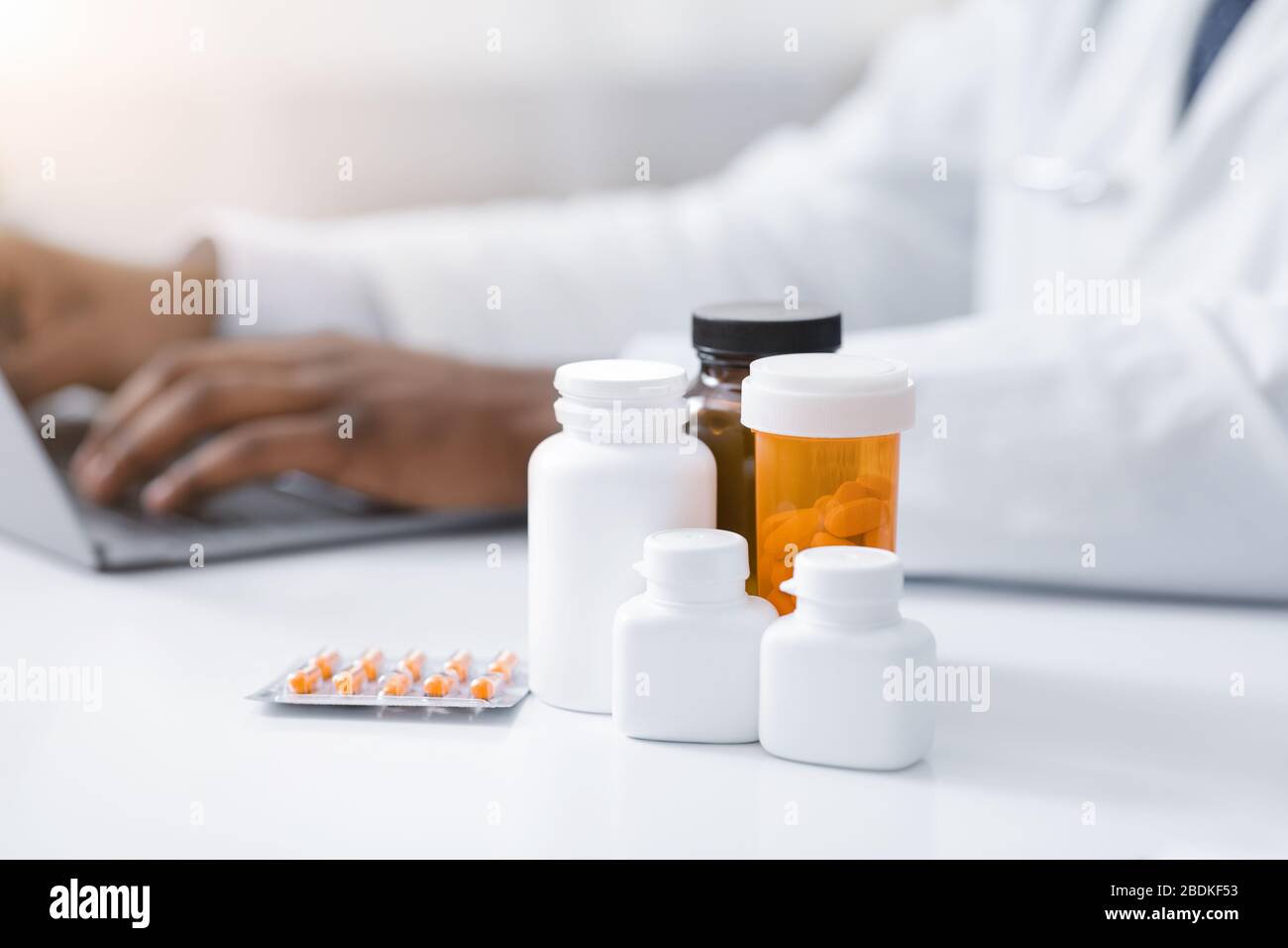 Diverse types of medicine over working doctor Stock Photo Alamy
