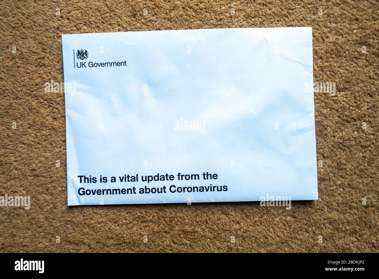 Letter and information pack sent by The UK Government to UK households in April 2020 giving instructions to follow and detailing advice on avoiding contracting the coronavirus. Stock Photo