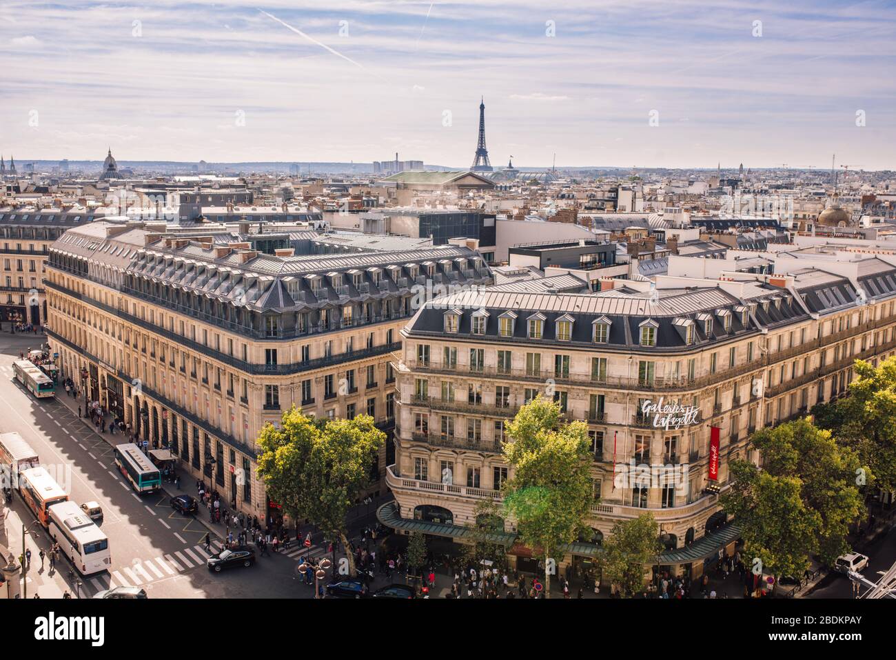 View of Paris from the top of the Lafayette Osman Gallery, with Japanese  retailer Uniqlo store and the famous Eiffel tower in the background on a  clou Stock Photo - Alamy