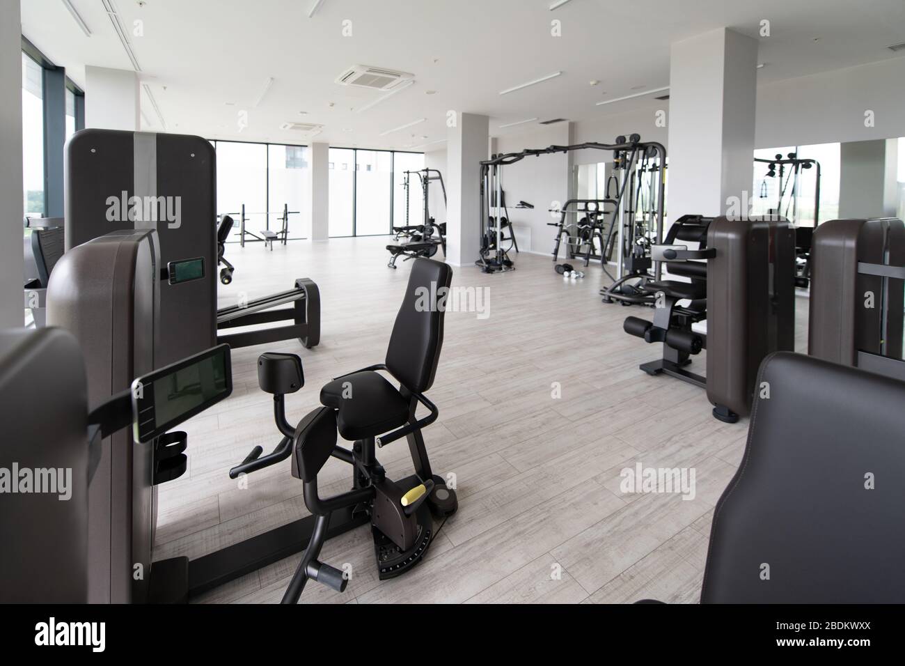 Modern Gym Room Fitness Center With Equipment And Machines Stock Photo ...