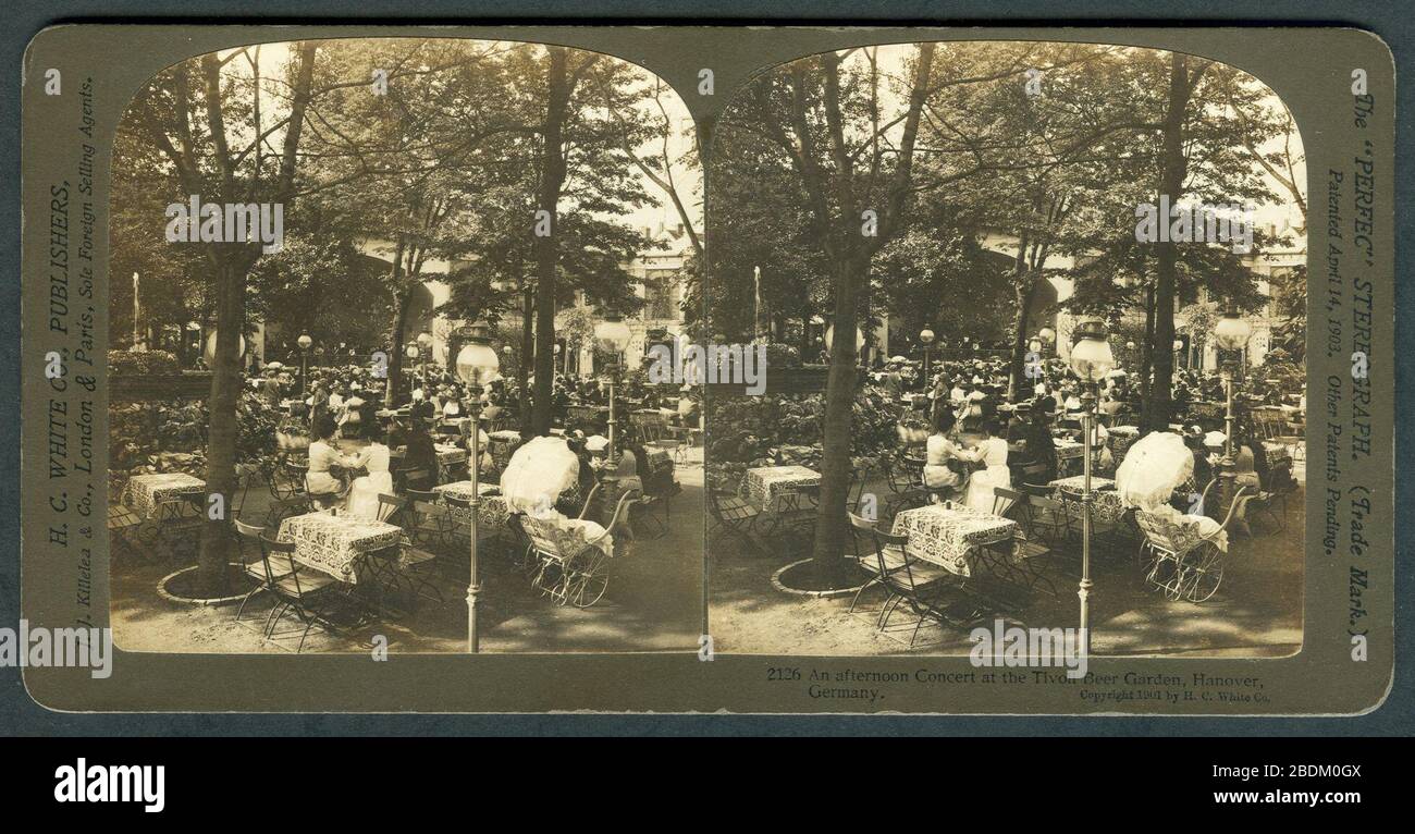 H. C. White Co. 2126 An afternoon Concert at the Tivoli Beer Garden, Hanover, Germany. 1901. The Perfect Stereograph Trade Mark Patented April, 14, 1903. Picture side. Stock Photo
