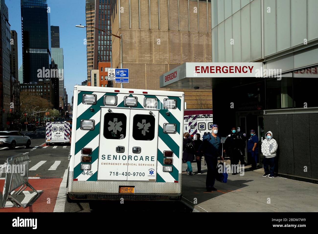 New York, United States. 07th Apr, 2020. An ambulance is parked by NYU Langone Hospital. With the mounting cases of COVID-19, the call centers around the city have seen a 50 percent rise in 911 calls overwhelming the Emergency Services Technicians personnel. Consequently, FEMA has sent 250 ambulances and 500 EMT personnel to New York. Additionally, while there are no exact numbers of personal protective equipment (PPE) FEMA has sent to hospitals, shortages continue. Credit: SOPA Images Limited/Alamy Live News Stock Photo