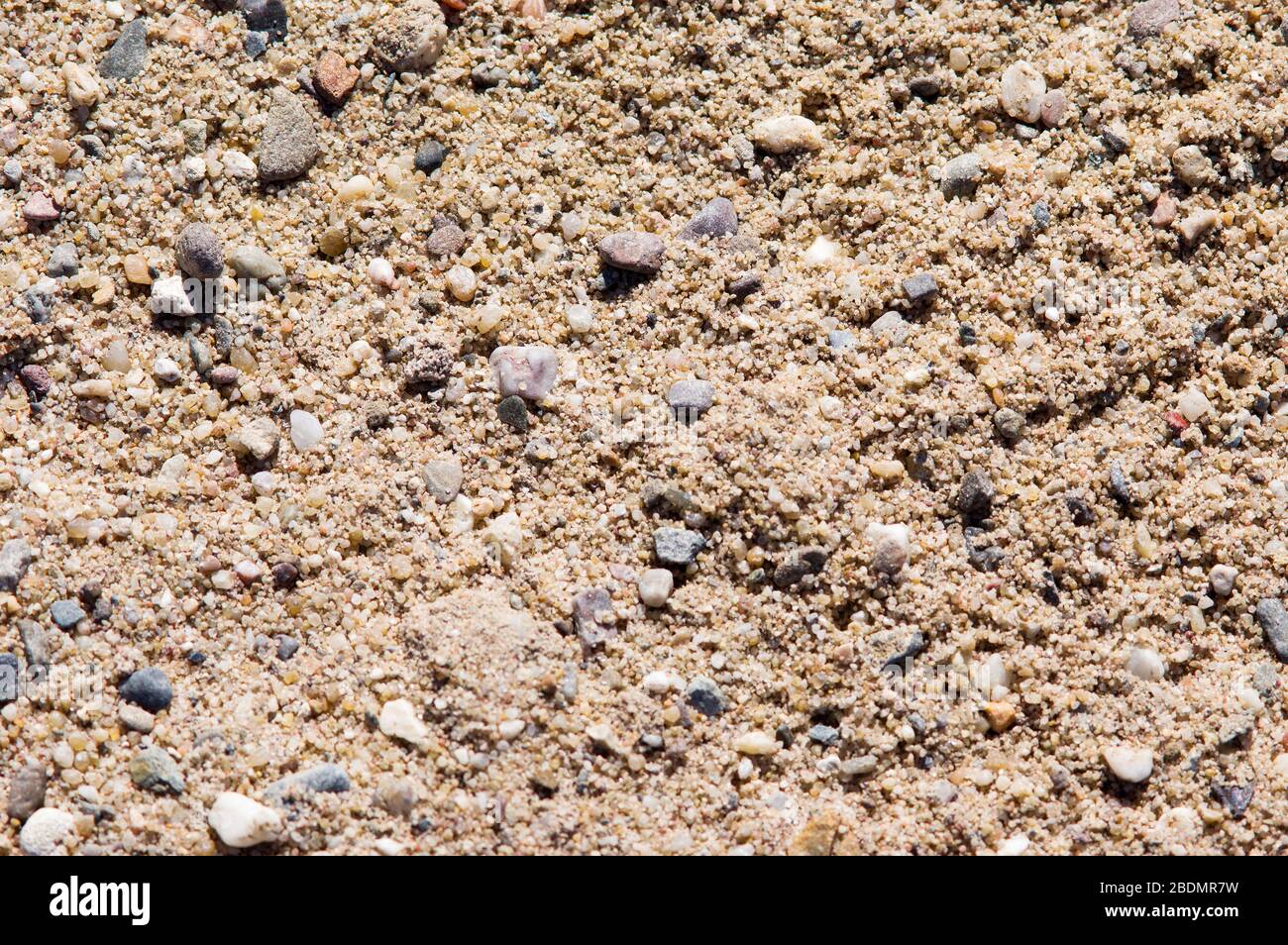 Pebbles and sand pattern background Stock Photo