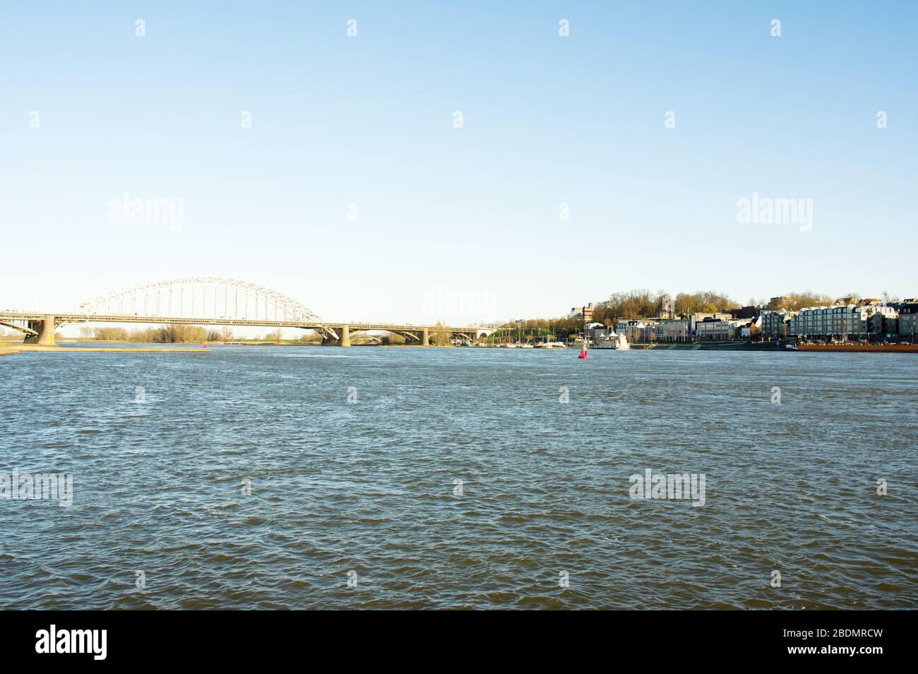 Cityscape of the city of Nijmegen with the bridge Waalbrug at the river Waal, Netherlands Stock Photo