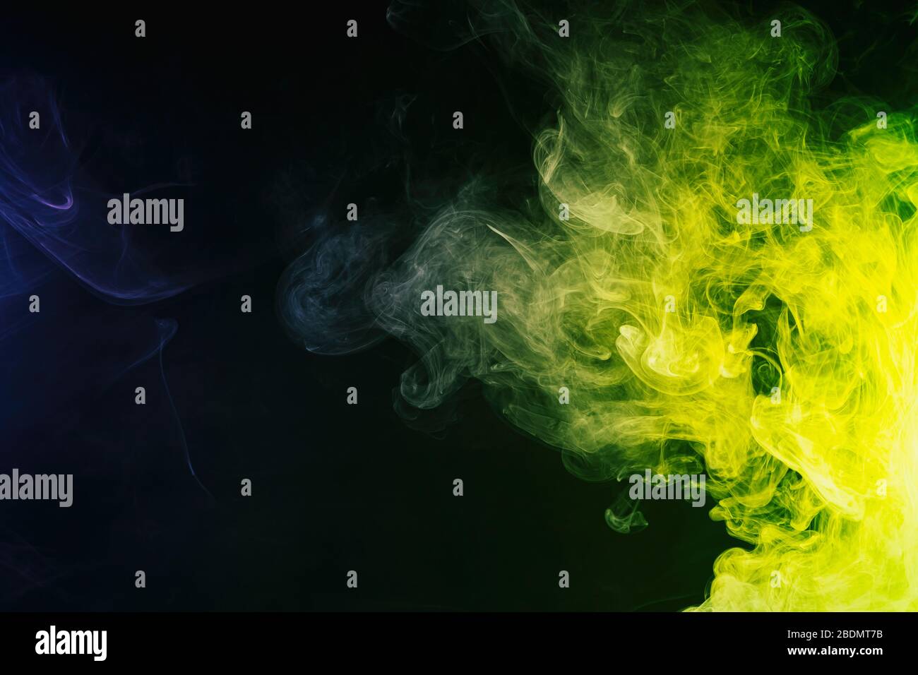 Pattern, Neon green and blue smoke in the on a dark isolated background ...
