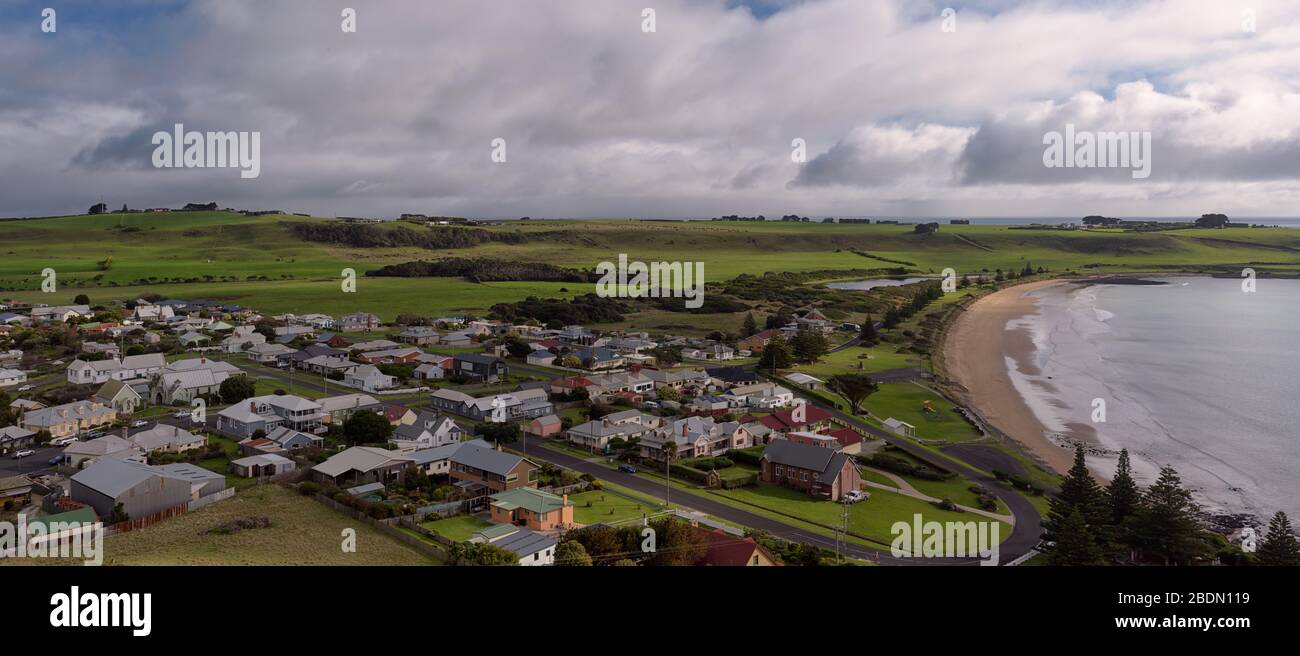 Panoramic view atop the Nut over the town of Stanley in Tasmania and its quaint village houses fringing one of the bays, from the scenic lookout. Stock Photo