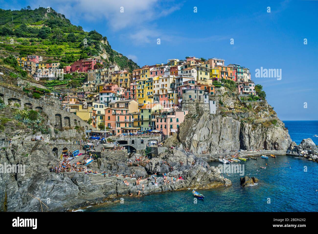 view of the ancient coastal village of Manorola in the Cinque Terre at Ligurian Riviera di Levante, Liguria, Italy Stock Photo
