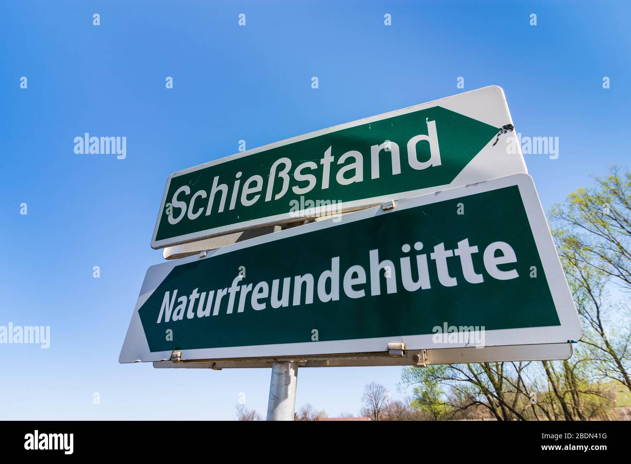 Mattersburg: sign 'Schießstand' and 'Naturfreundehütte', big difference in leisure activities, in Neusiedler See (Lake Neusiedl), Burgenland, Austria Stock Photo