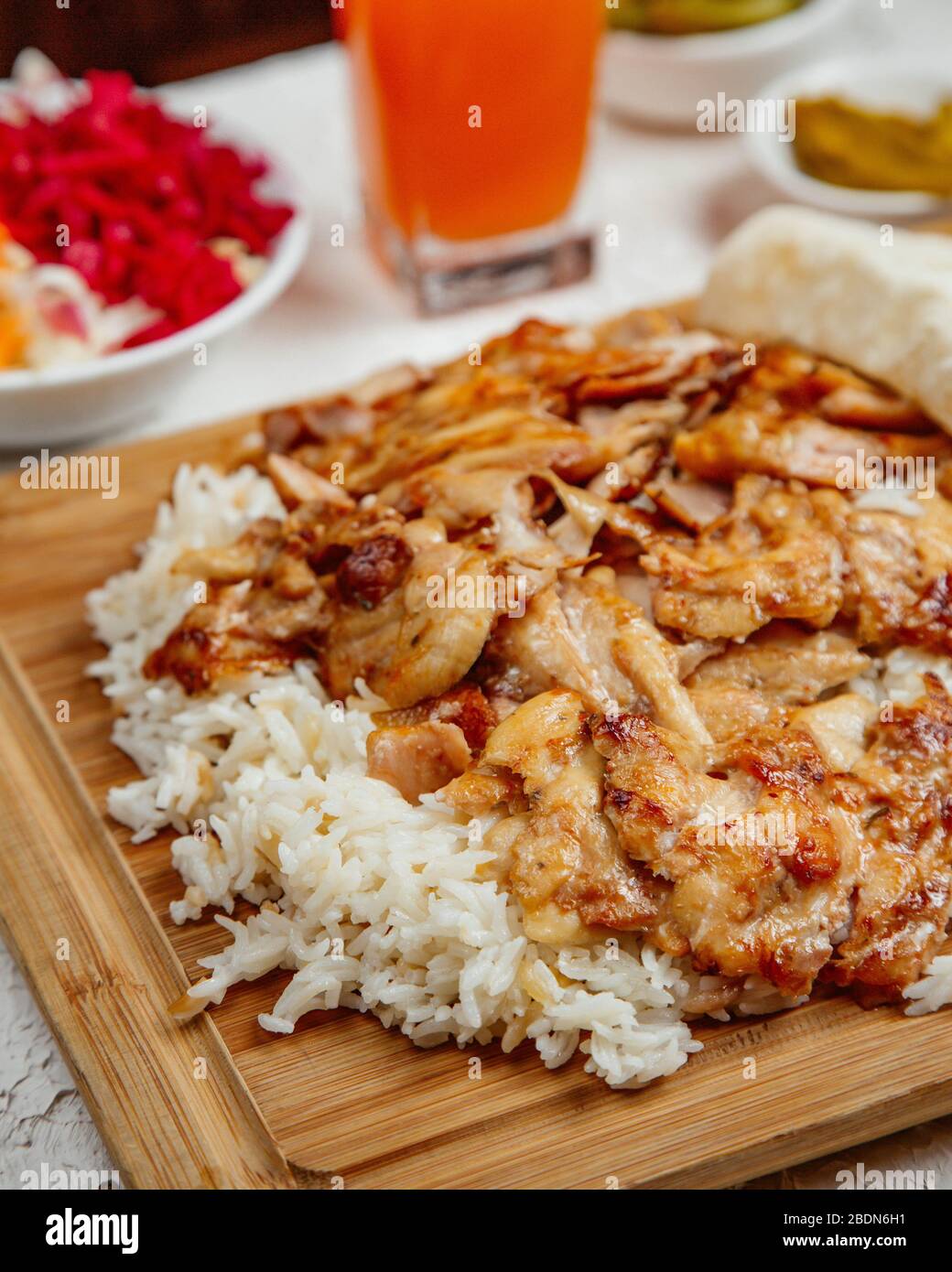 chicken doner kebab served with rice Stock Photo - Alamy