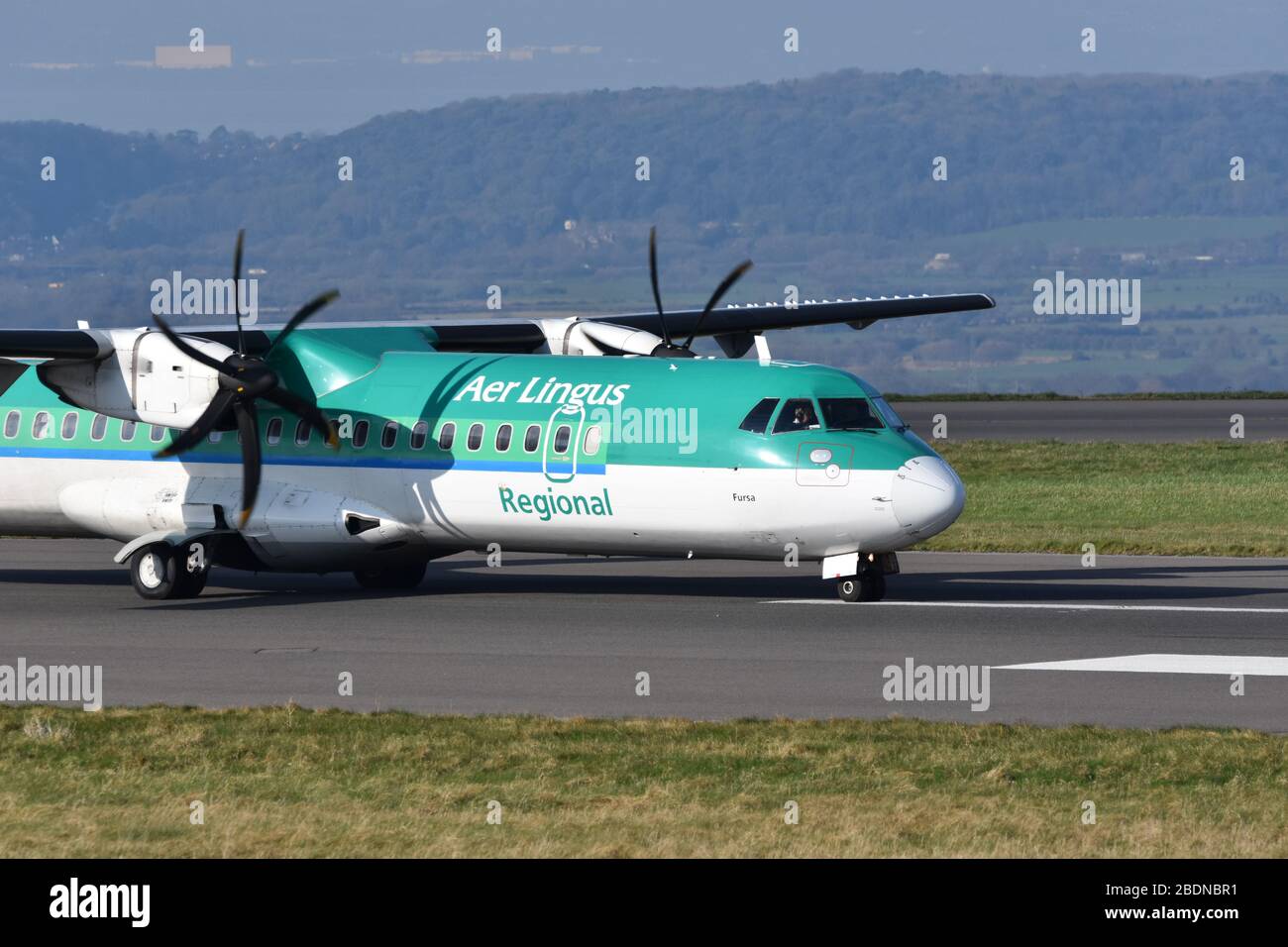 A small Aer Lingus regional airline propeller plane at Bristol International Airport Stock Photo