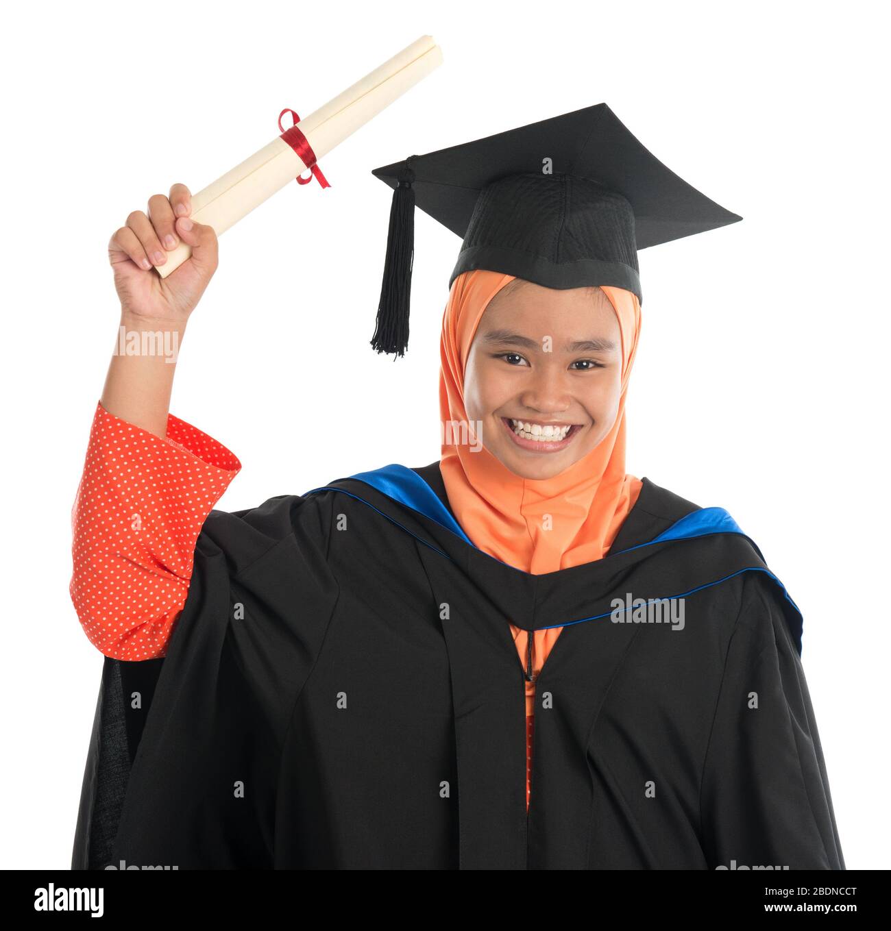 Female student in graduation gown, standing isolated white background