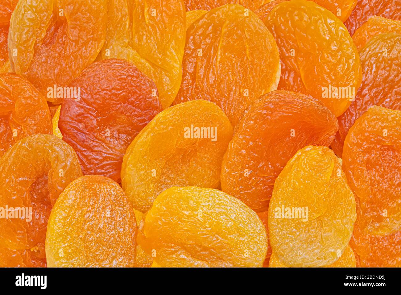 Top view of dried apricots close up. Food background. Stock Photo