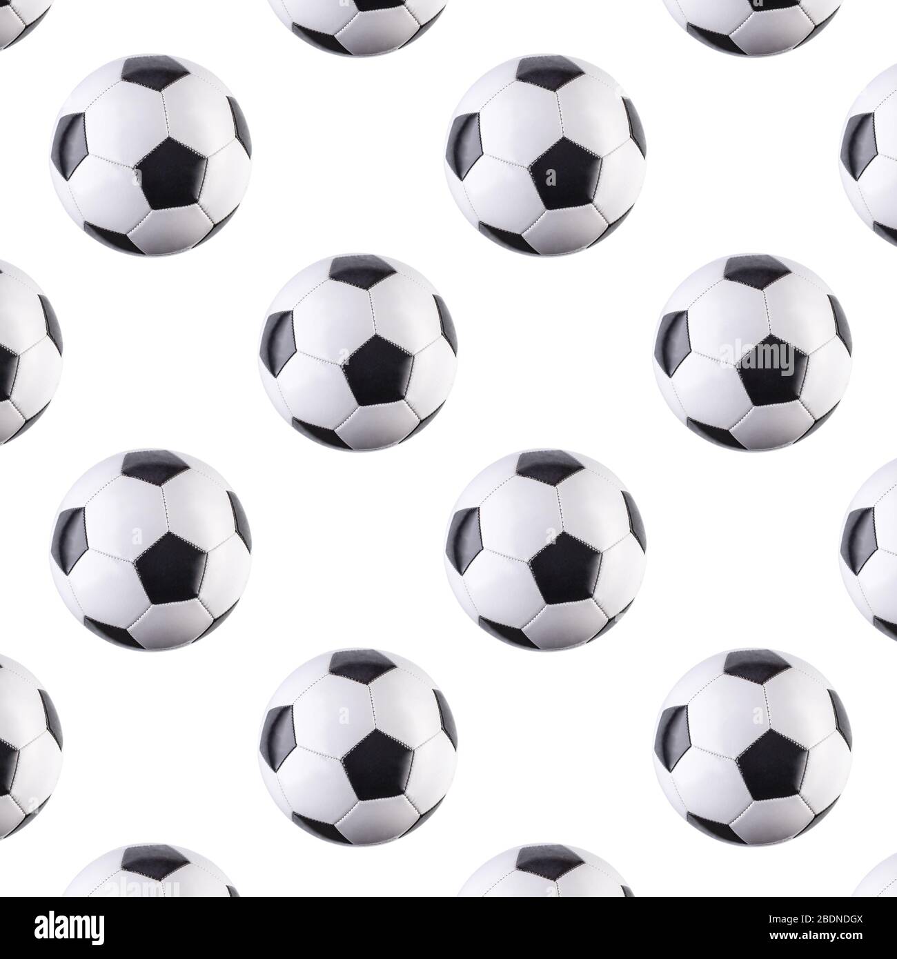 Seamless pattern of balls. Black and white soccer balls flying in the air, isolated on white background. Minimalistic concept of sports Stock Photo