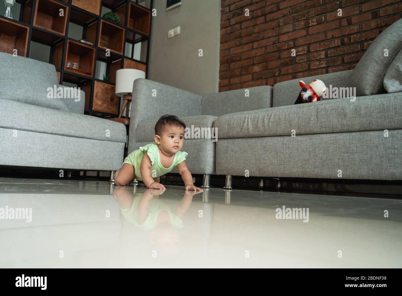 Asian baby crawl hi-res stock photography and images - Alamy