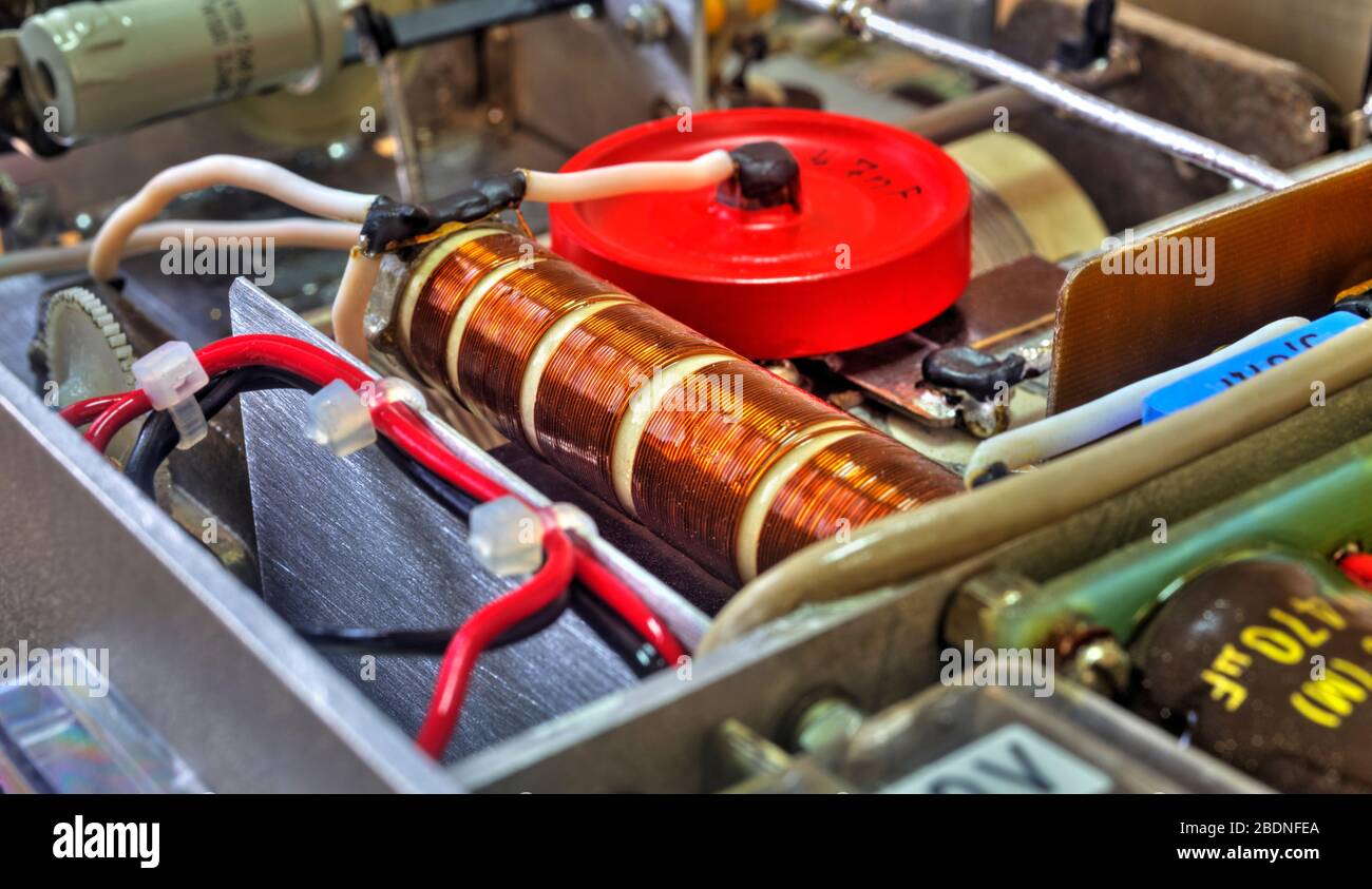 Inside view of high frequency power amplifier with capacitors, coils