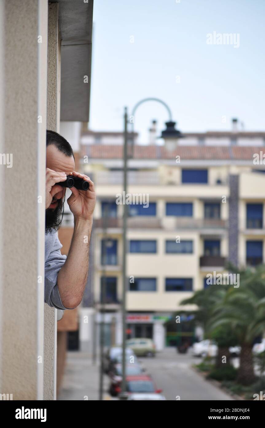 Man binoculars spying hires stock photography and images Alamy