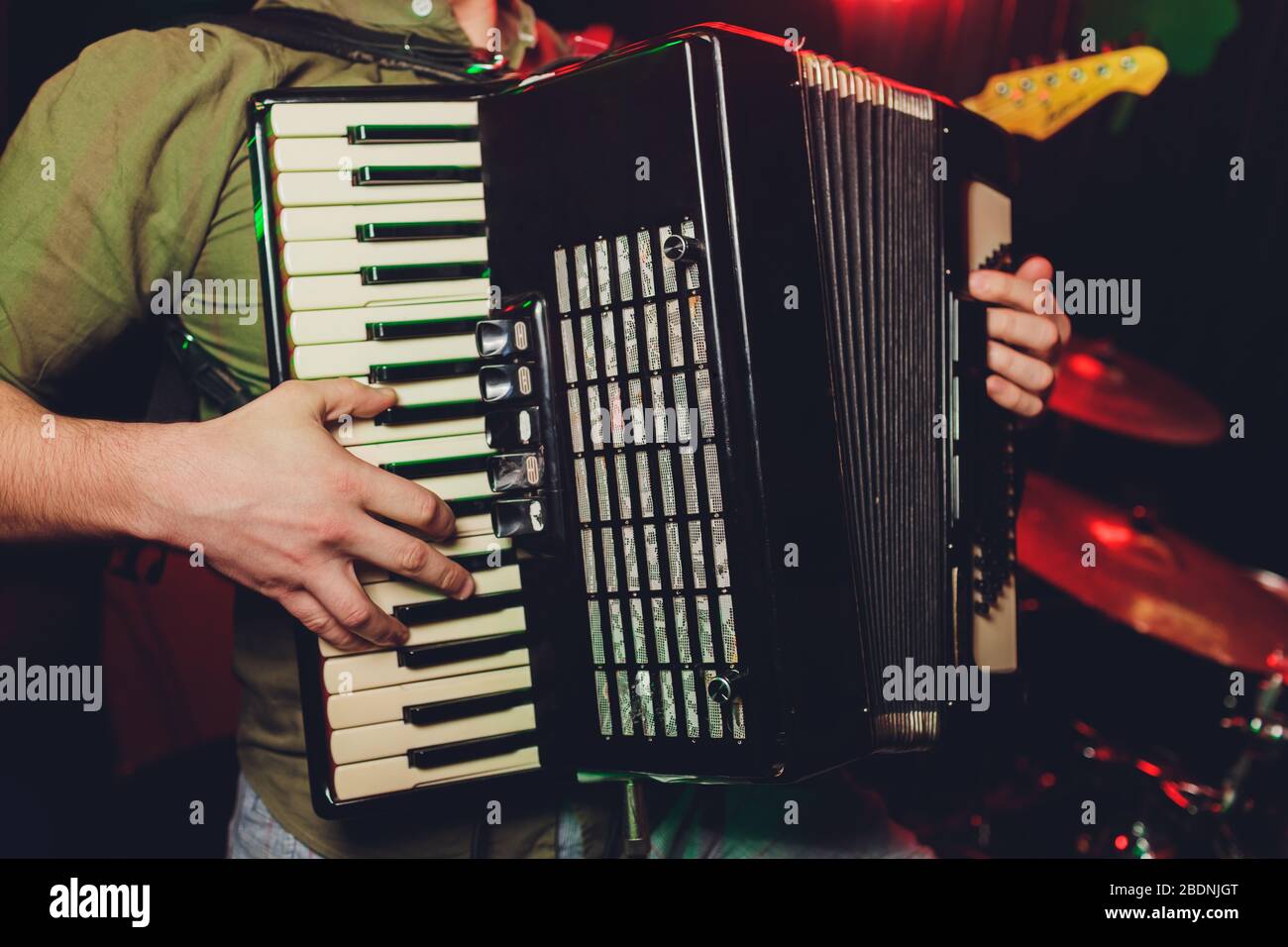 The musician plays the accordion closeup club Stock Photo Alamy
