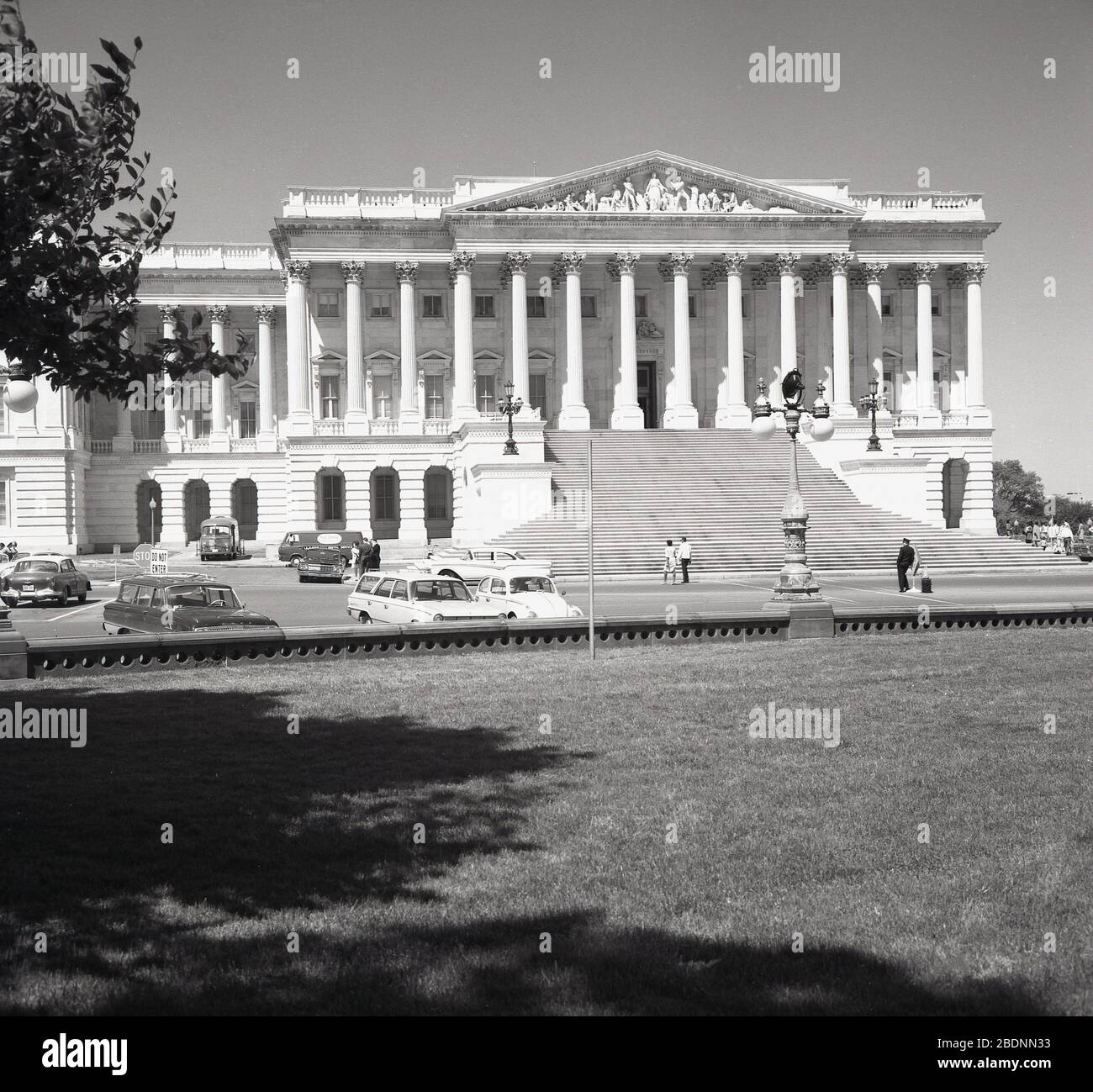 1960s, historical, Summertime, Washington D.C and an exterior view from this era of the grand columned the US Capitol building, showing the Library of Congress. Stock Photo