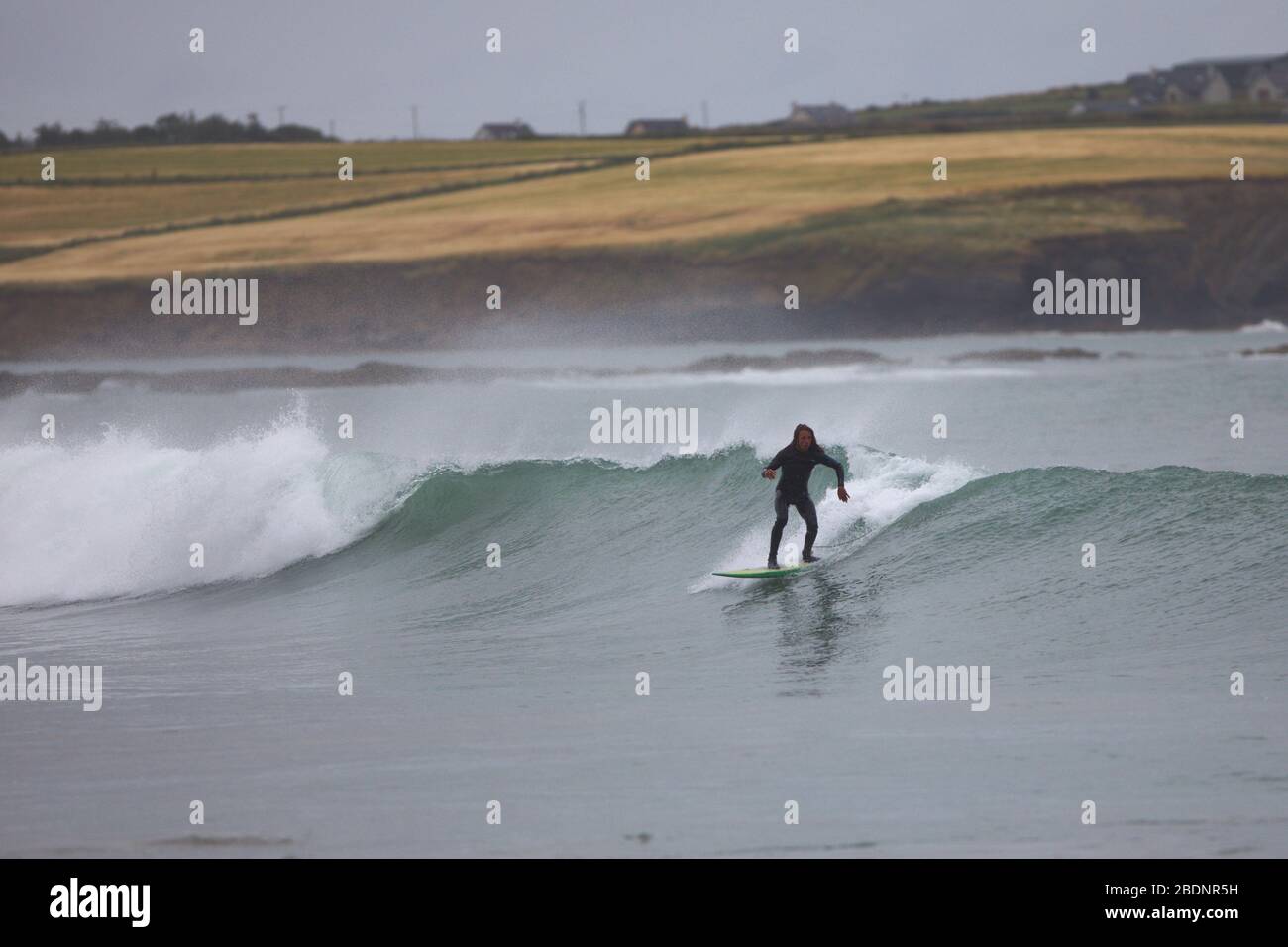 Surfing on the south coast of Ireland, Garretstown Cork Stock Photo