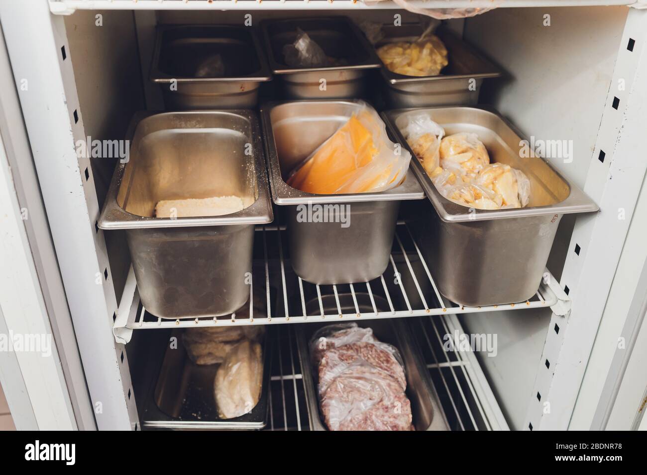 Freezer refrigerator with various frozen foods billet storage restaurant Stock Photo Alamy