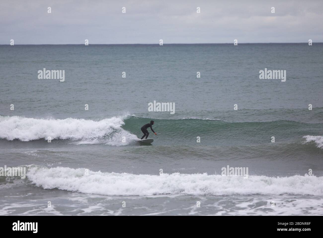 Surfing on the south coast of Ireland, Garretstown Cork Stock Photo